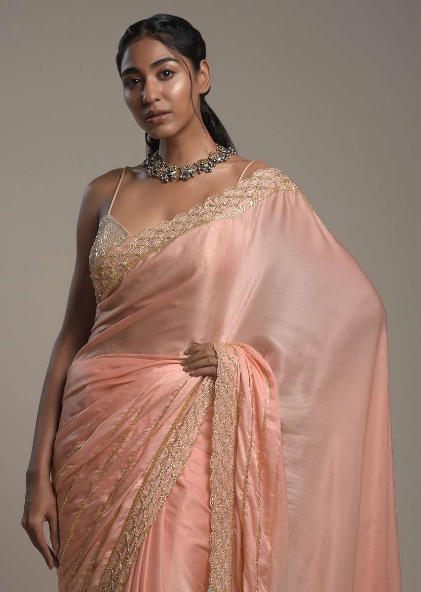 peach-saree-in-satin-with-cut-dana-and-zardosi-embroidered-stripes-and-unstitched-blouse-online-kalki-fashion-k002srhs1090y-sg53445_6_67180ce0-96e3-4b61-bda8-8fc9cbbe5992.jpg