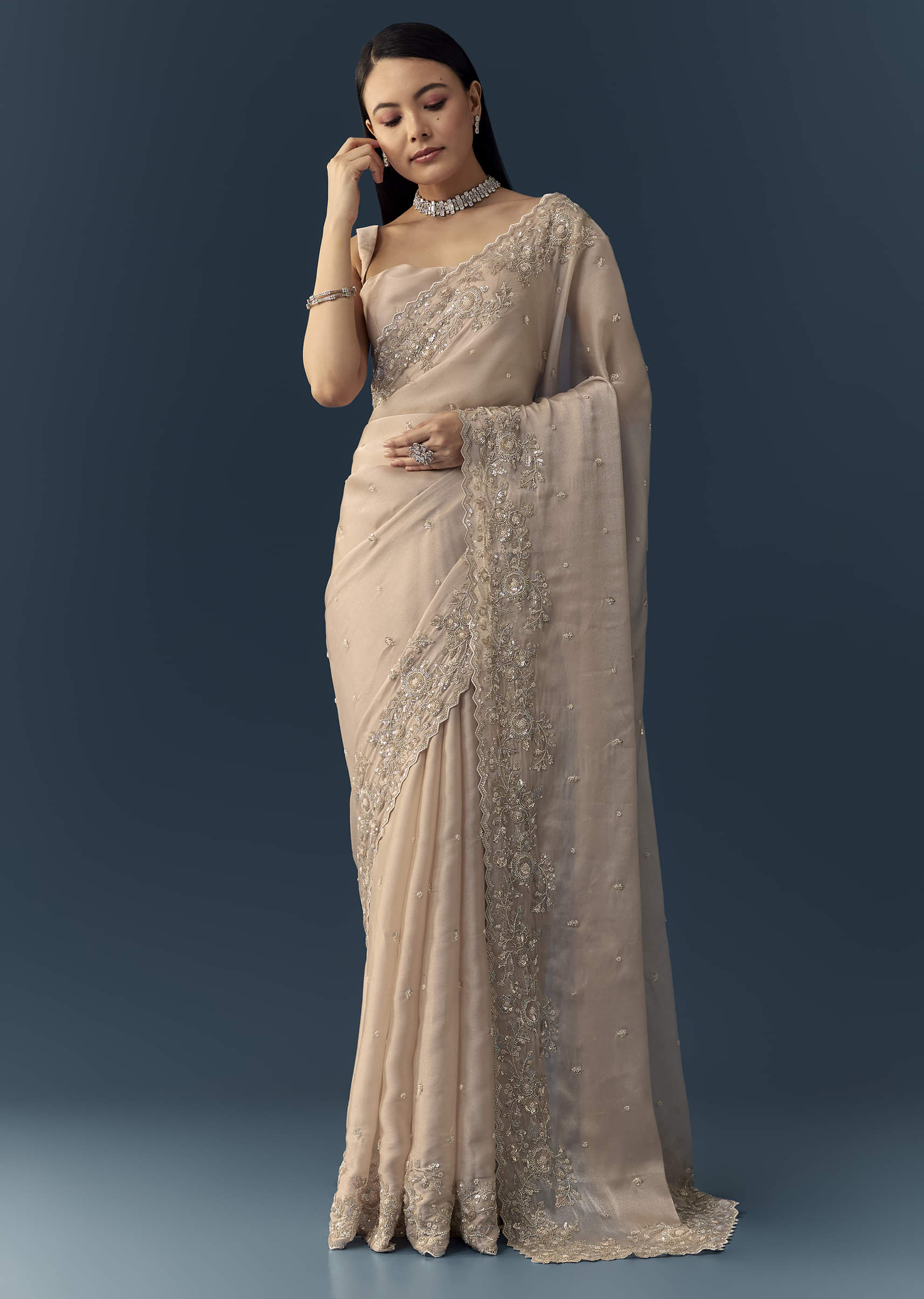 peach-tissue-organza-cutwork-saree-with-unstitched-blouse-fabric-sg345840-1.jpg