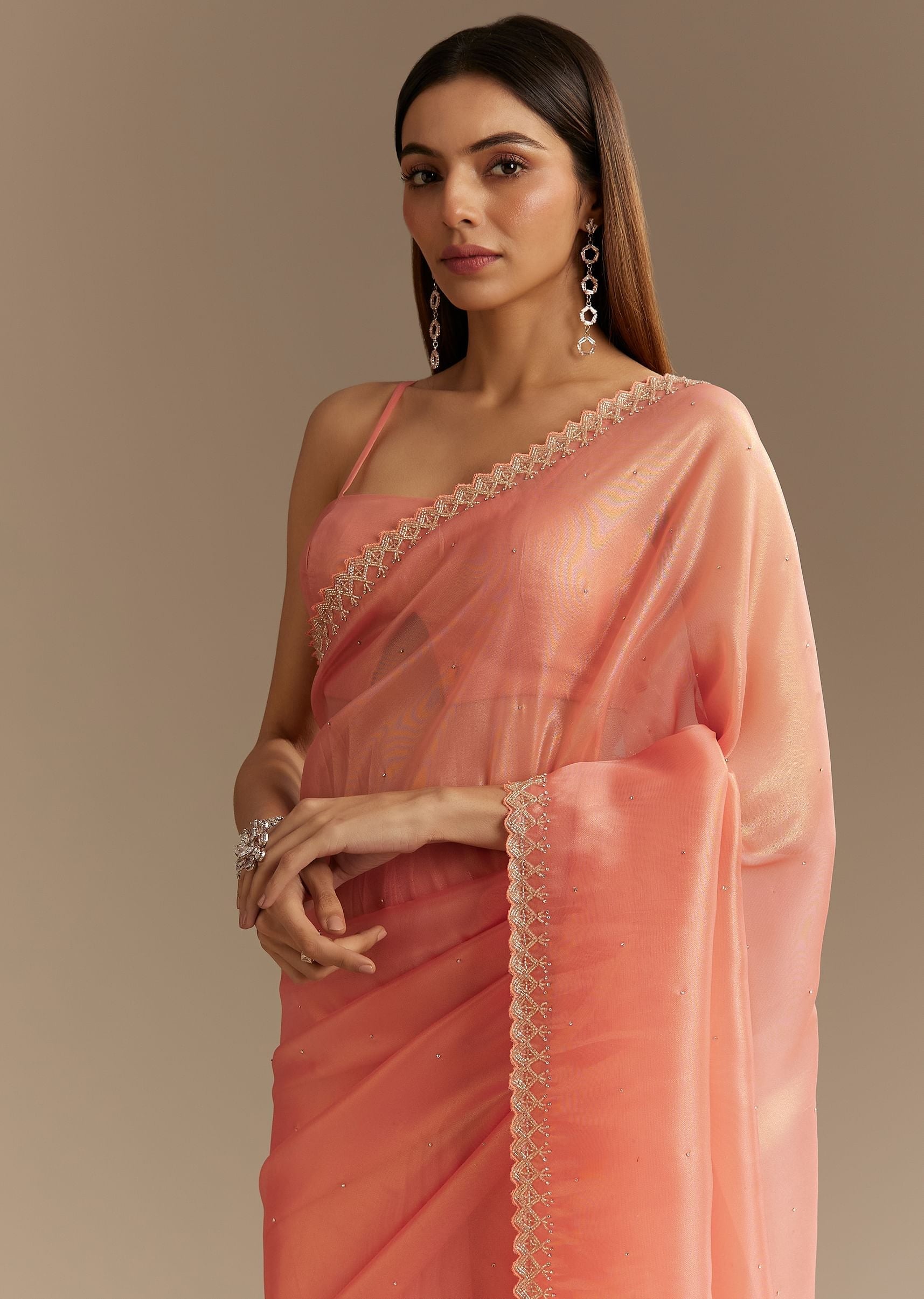peach-tissue-saree-with-stones-cutdana-embellishments-and-scallop-border-sg294557-4_bc2c045d-b0f4-4e2b-bb8c-248d2f981b16.jpg