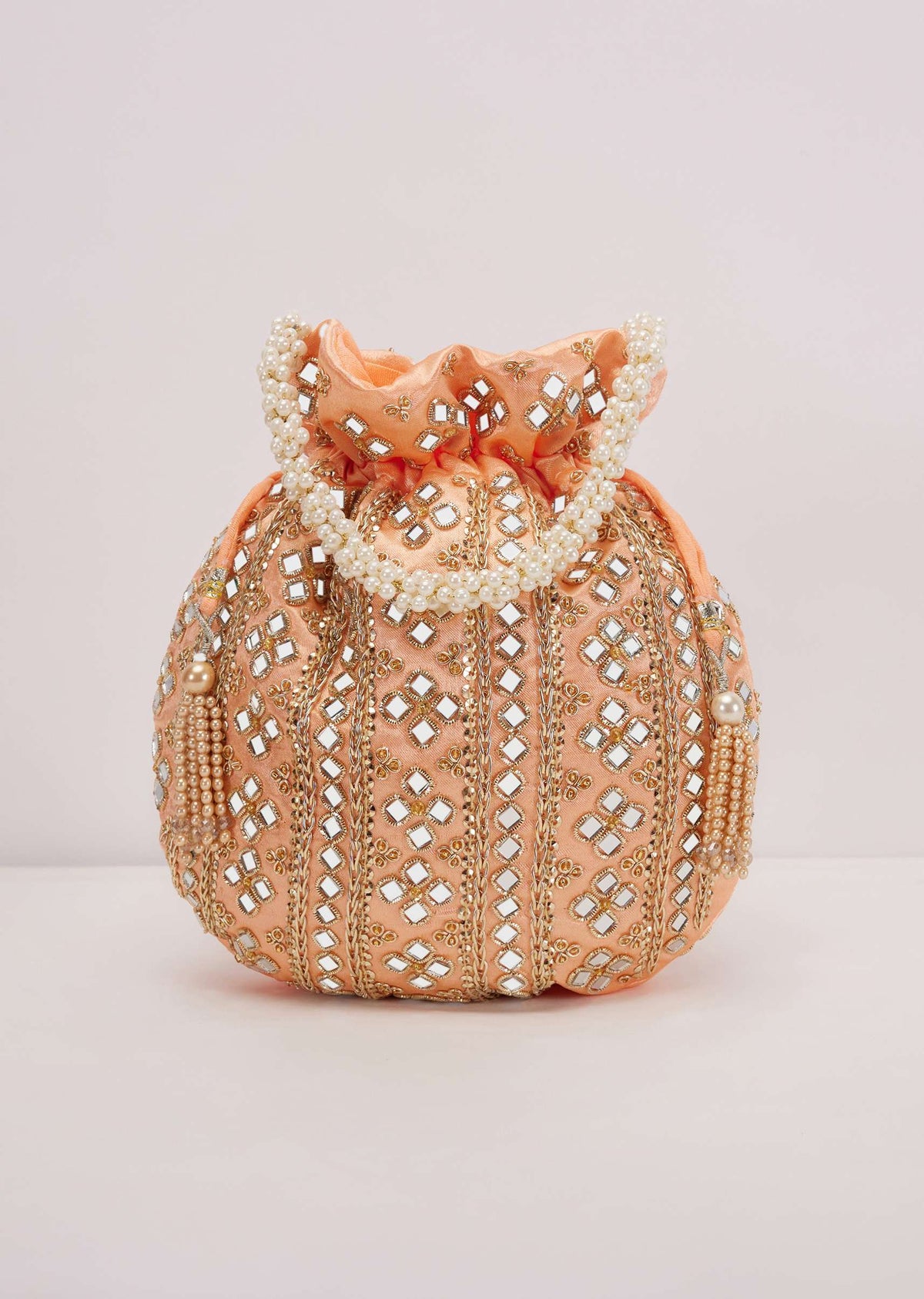peach_fuzz_mirror_work_silk_potli_pearl-sg91875_1_2b314cff-f832-491a-8a73-c498f7efc9f4.jpg