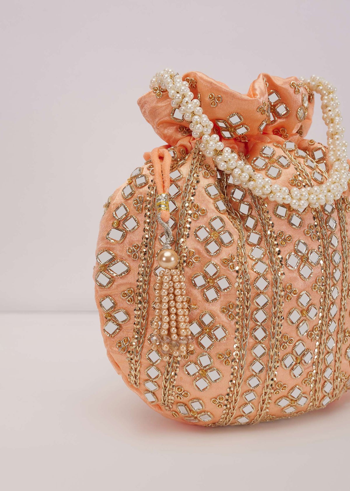 peach_fuzz_mirror_work_silk_potli_pearl-sg91875_4_330fe019-c967-472d-9601-5720cea4d7a0.jpg