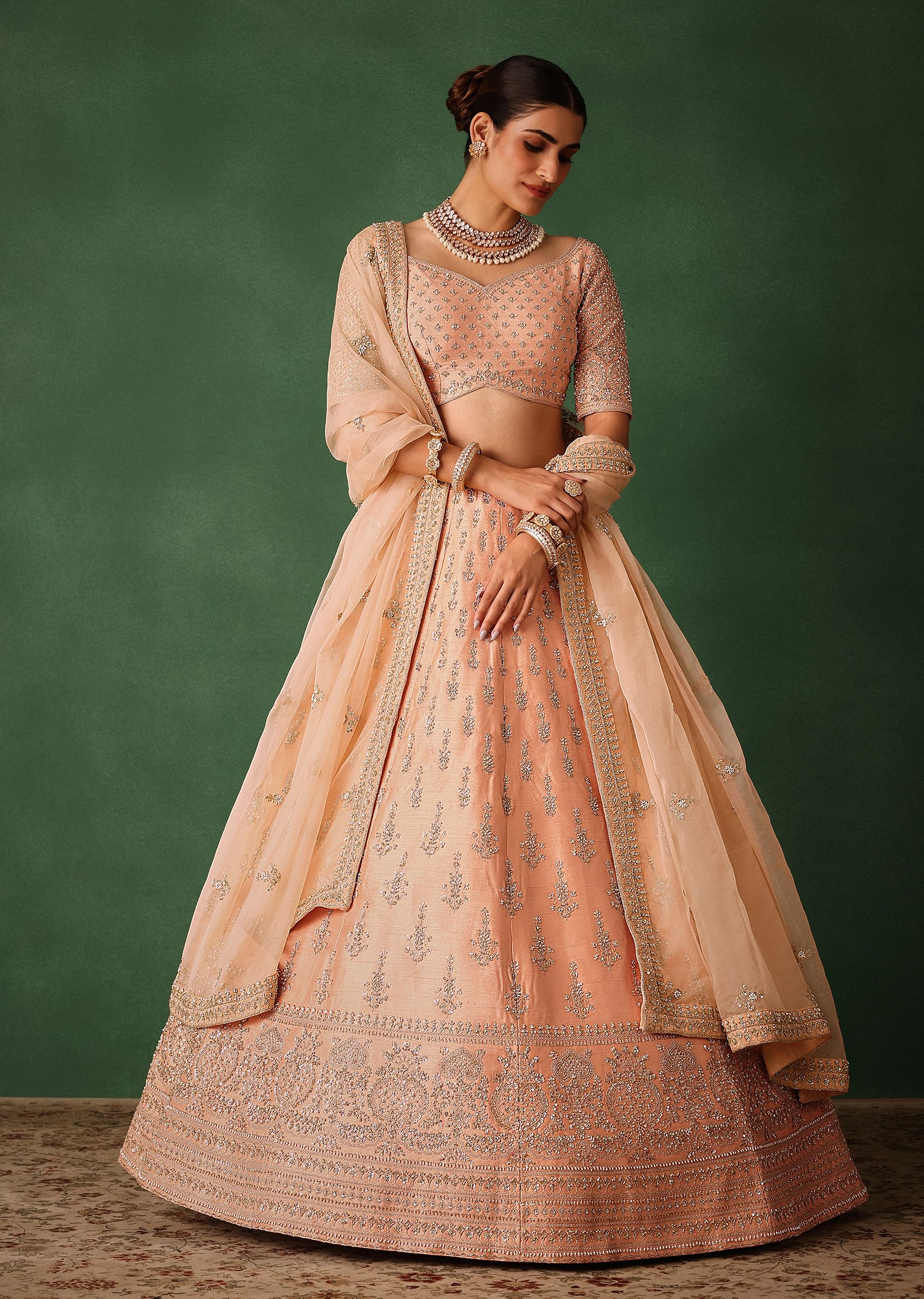 peach_hand_embroidered_raw_silk_lehenga_set_with_butti_work-sg224060_1_8f217827-ff0c-429f-8ebc-c17b7f1efc4c.jpg