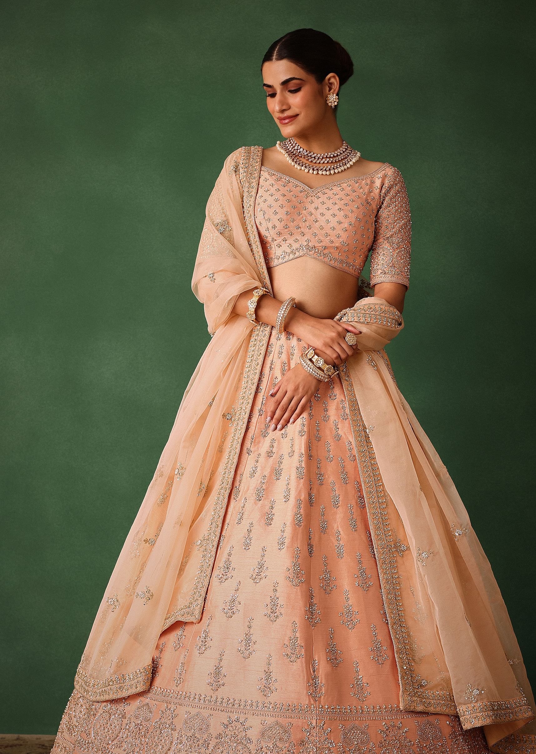 peach_hand_embroidered_raw_silk_lehenga_set_with_butti_work-sg224060_6_681fd4fd-e898-41ce-8643-71be355fe69f.jpg