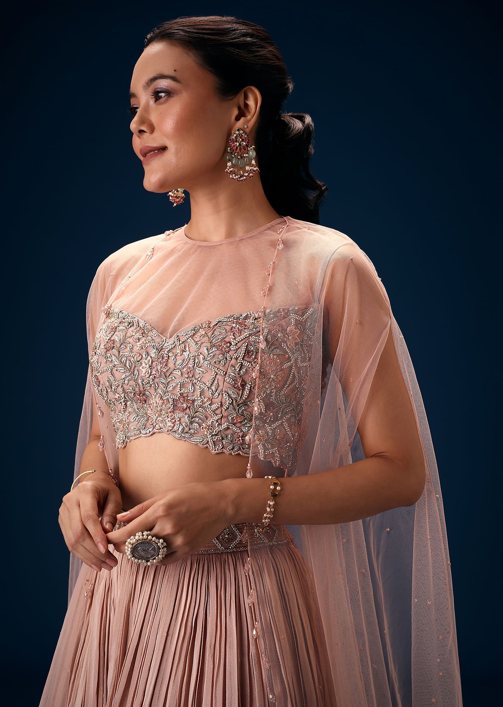 peach_ruched_lehenga_with_embroidered_blouse_and_net_cape-sg251638_4_efd2d2e4-3467-4bc1-b1b3-52025e210b9c.jpg
