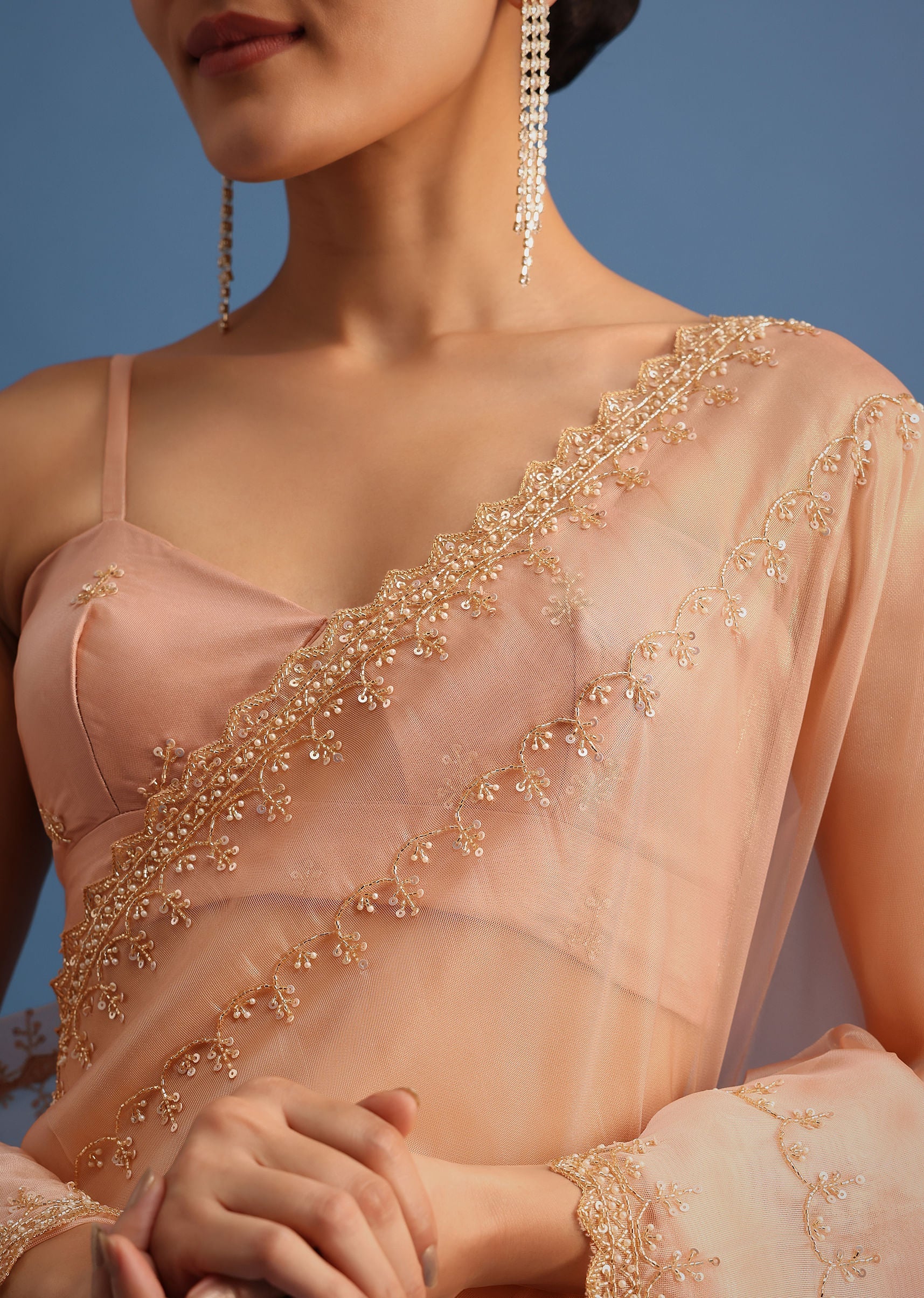 peach_tissue_saree_with_cutdana_embroidered_border_and_unstitched_blouse-sg213209_4_67c34e55-4c15-4cfd-a7bc-afa942543ad8.jpg