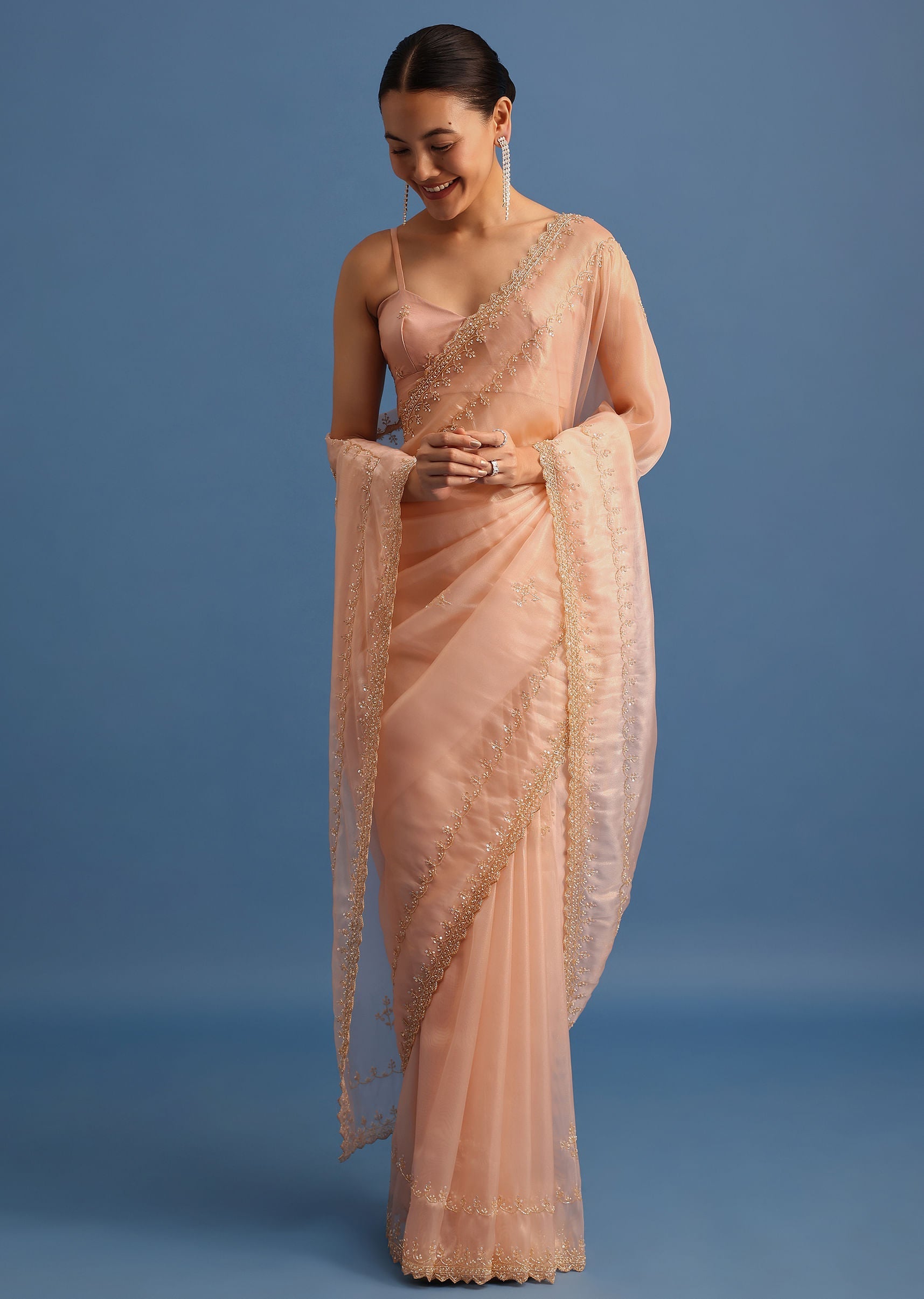 peach_tissue_saree_with_cutdana_embroidered_border_and_unstitched_blouse-sg213209_6_f1a73a16-44af-4cb9-8372-48ef3bee6315.jpg