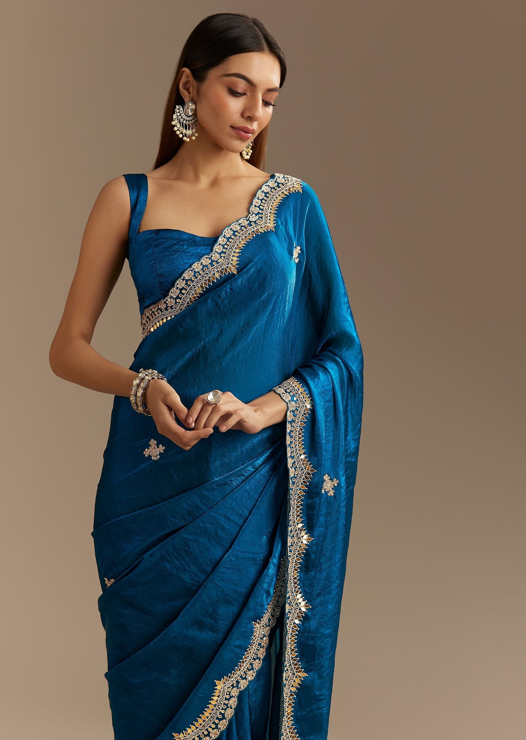 peacock-blue-satin-saree-with-gotapatti-zardosi-stones-and-cutdana-embroidery-sg294649-1_aa6269ab-abf8-43ef-9389-b3bbdc480c0f.jpg