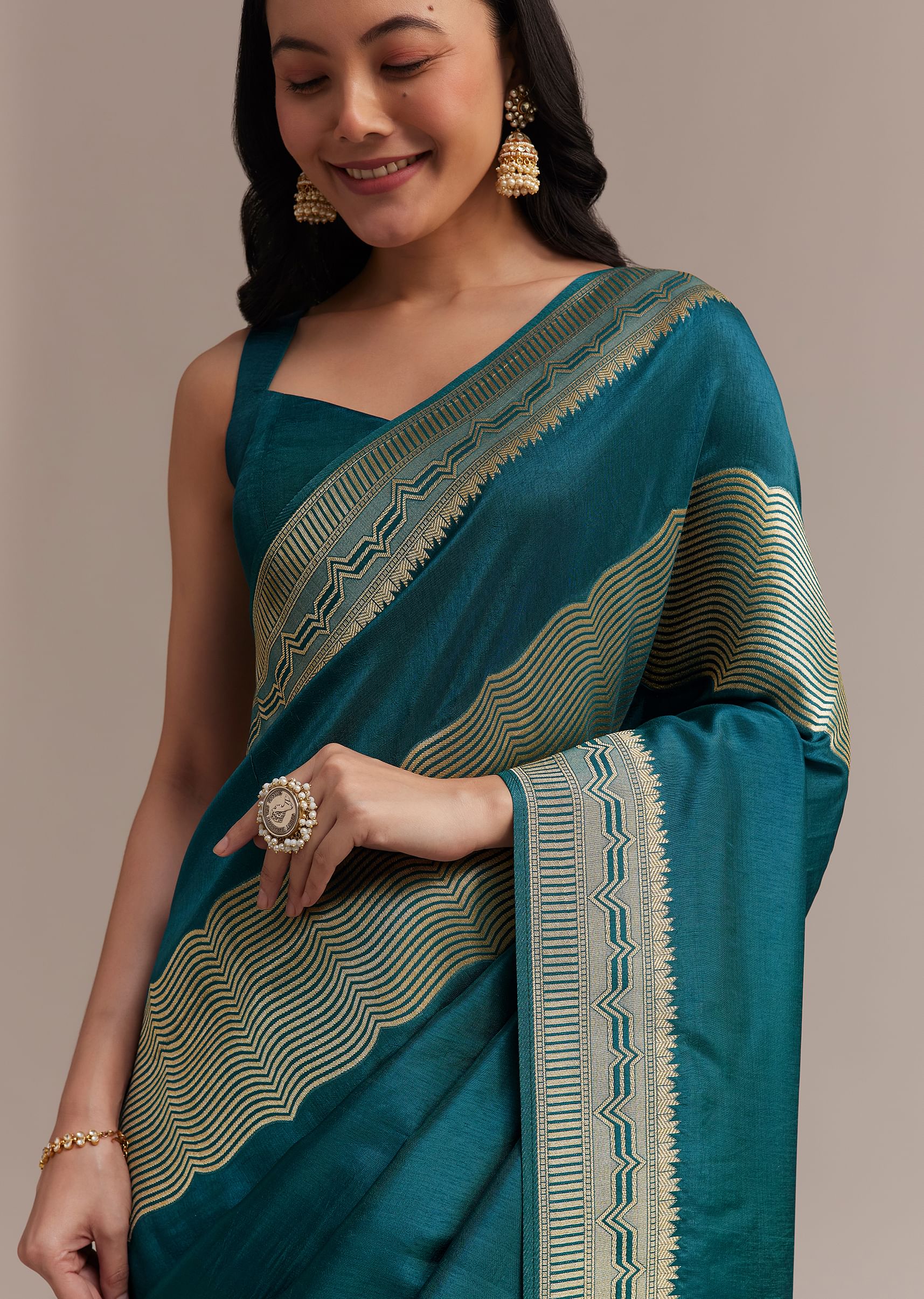 peacock_blue_dola_silk_saree_with_all_over_zari_weaving-sg276476_5_0db063de-5e5a-491d-a190-188564a40ac5.jpg