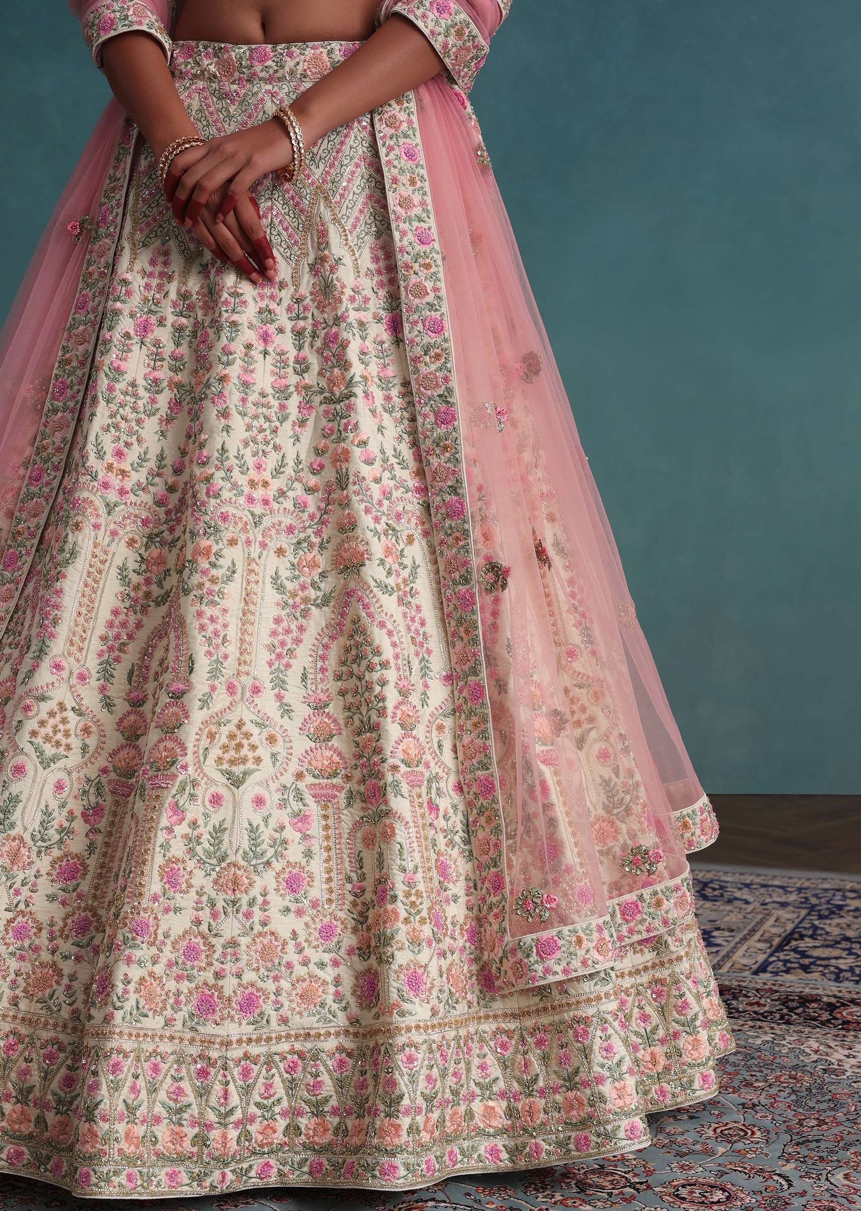 pearl_white_embroidered_bridal_lehenga-sg106406_7_e2e3ba9f-de08-4e3d-9efe-57dd1b72d8c1.jpg