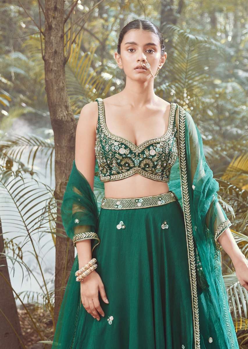pine-green-lehenga-choli-in-raw-silk-with-butti-work-and-heavy-hand-embroidery-in-mughal-motifs-on-the-choli-online-kalki-fashion-m001at285y-sg52274_1_2502a1fe-5c57-495b-9194-a0c2672f3555.jpg