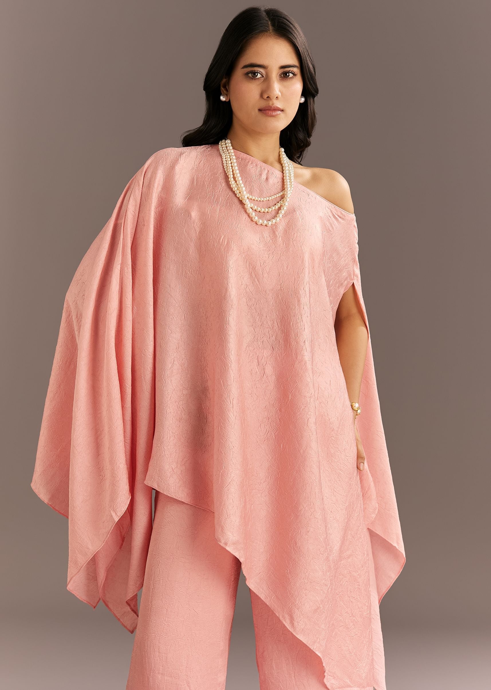pink-crush-silk-one-shoulder-kurta-with-pearl-neckpiece-sg312713-1_5a09356a-3c69-40c6-a178-1f0a82f448fd.jpg