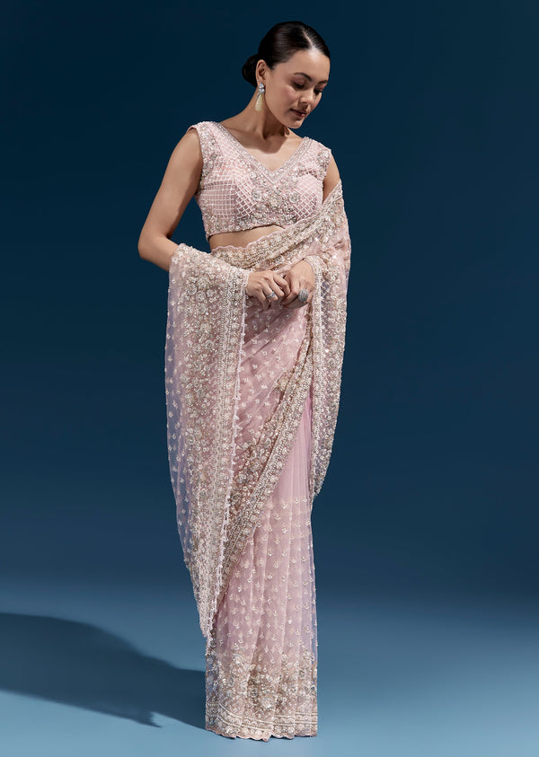 Pink Heavy Embroidered Net Saree With Scalloped Border And Tasselled Pallu