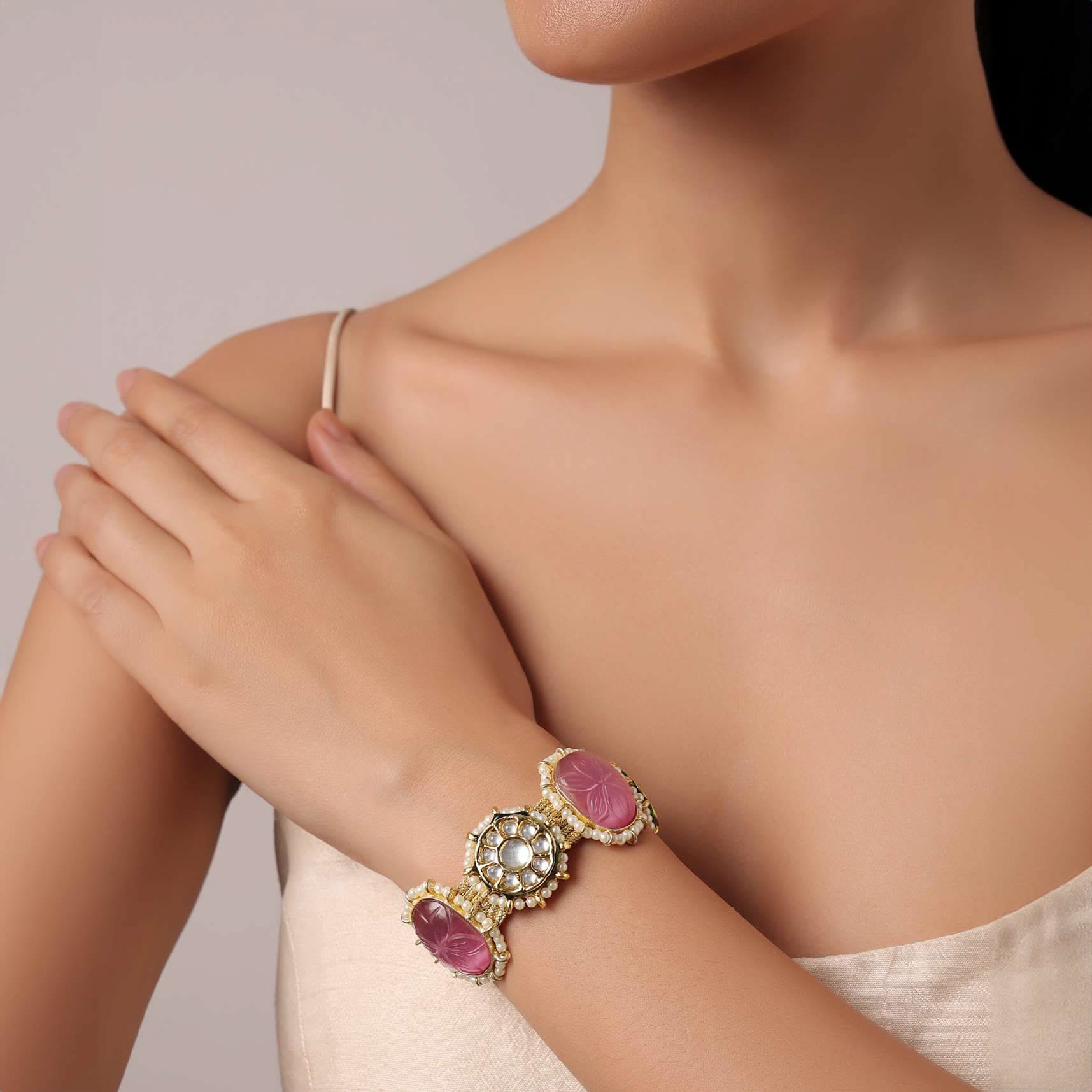pink_kundan_studded_bracelet_with_carved-sg180731_1_2a19493e-fba1-4930-a8fe-c8b0d39203aa.jpg