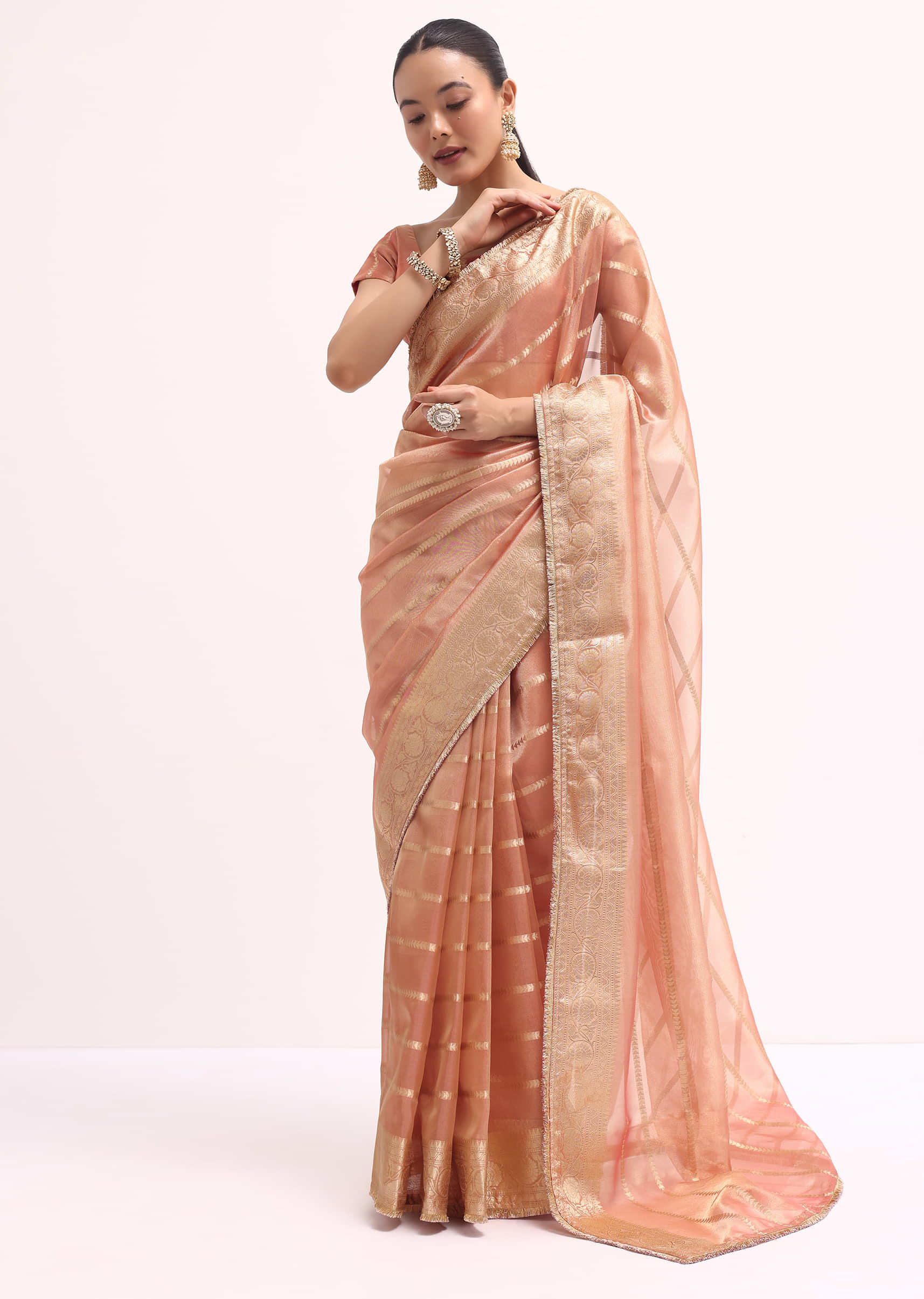 pinkish_gold_zari_chanderi_silk_saree_with_unstitched_border-sg213253_9_437595a6-7e84-490d-ba4c-5d20d9fe6f6a.jpg