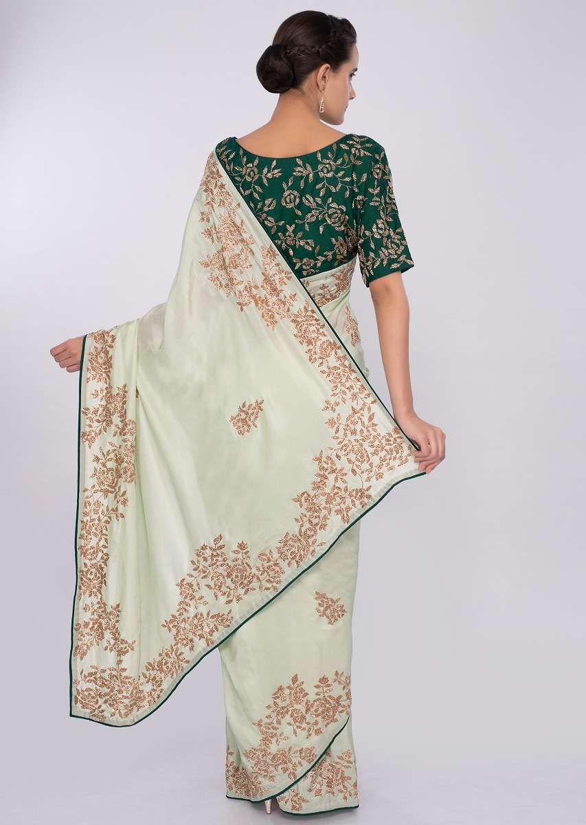 pista-green-satin-saree-with-emerald-green-silk-blouse-with-cut-dana-embroidery-only-on-kalki-434273_7_2575b650-cc2f-4f1b-8d0b-125294a91358.jpg