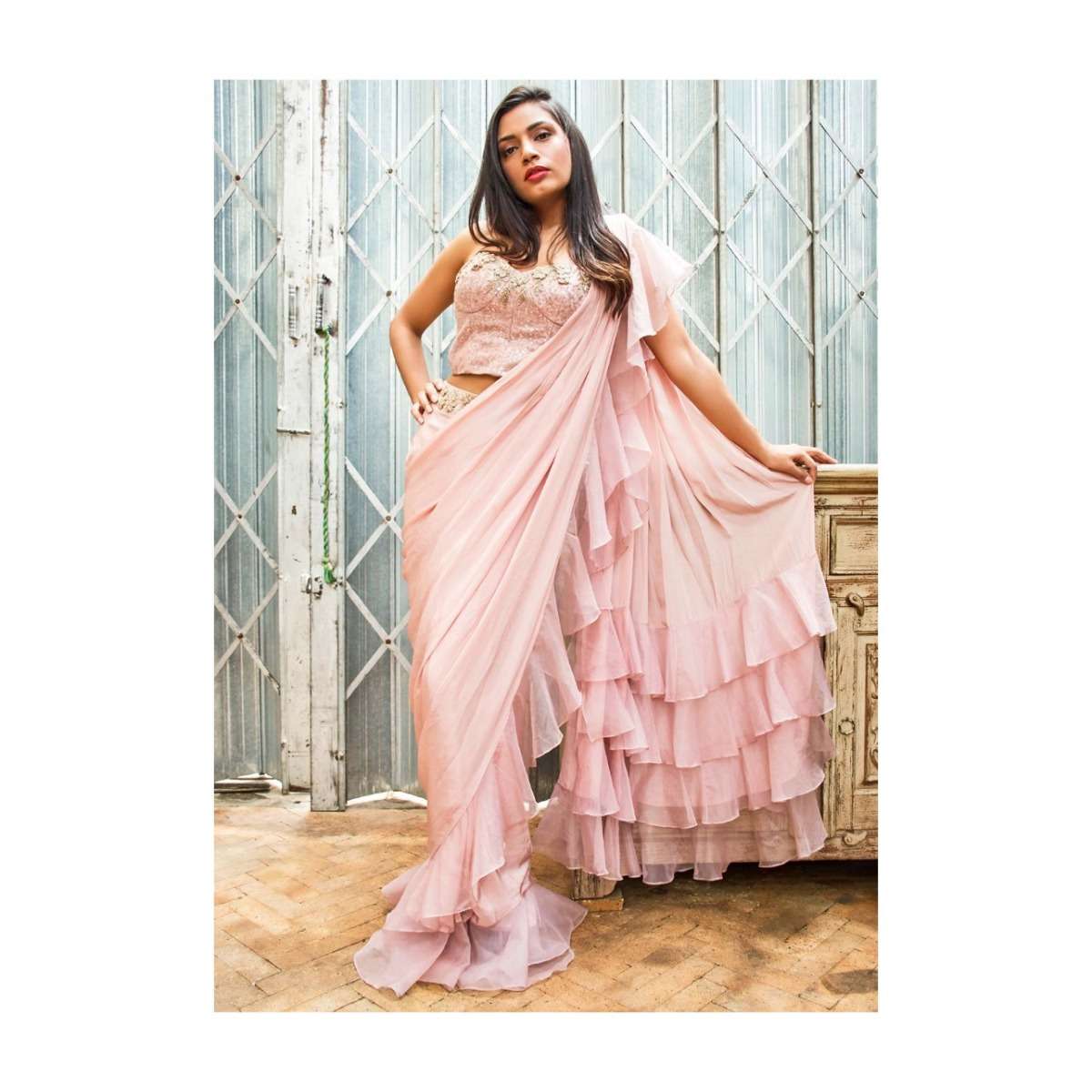 powder-pink-ready-pleated-draped-saree-with-hem-and-pallo_475845_4b8f19c0-a862-4fa5-8ed4-68cbb9c3edbe.jpg