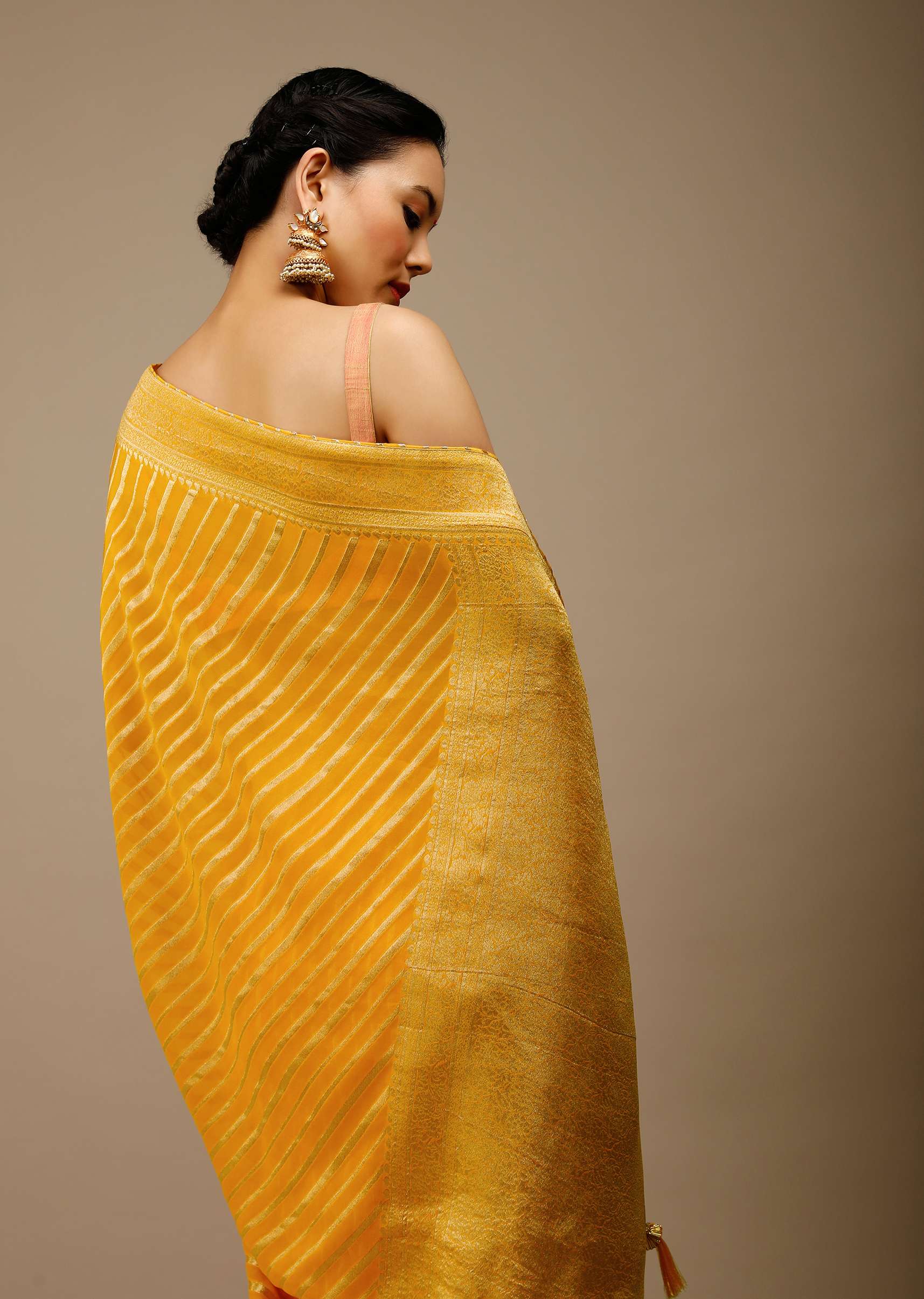 radiant-yellow-saree-in-georgette-with-brocade-woven-diagonal-stripes-and-floral-border-online-kalki-fashion-j004pf1081y-sg70054_6_d509f897-c4e1-4776-9386-6c9cbca7206f.jpg