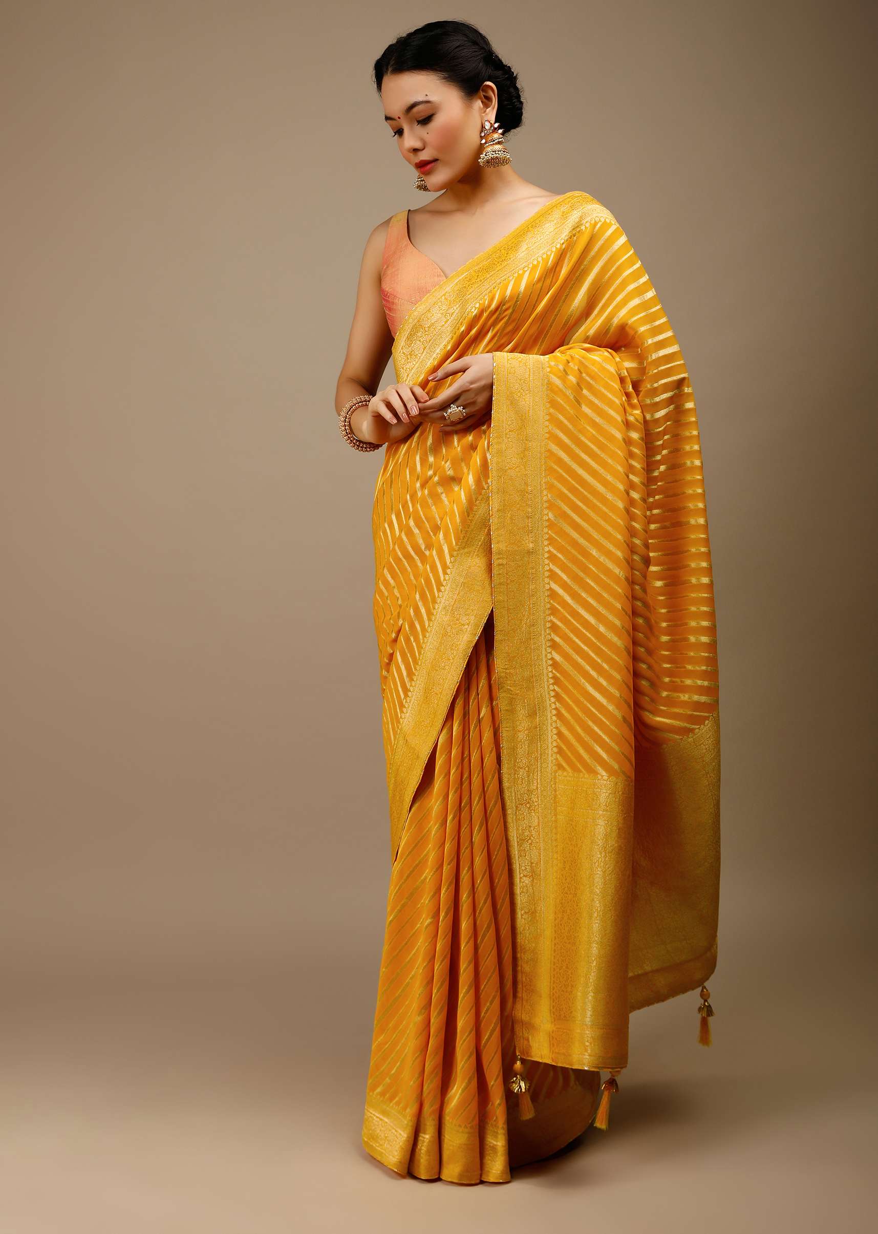 radiant-yellow-saree-in-georgette-with-brocade-woven-diagonal-stripes-and-floral-border-online-kalki-fashion-j004pf1081y-sg70054_7_29126f38-82ef-43d9-abad-908d0da979b4.jpg