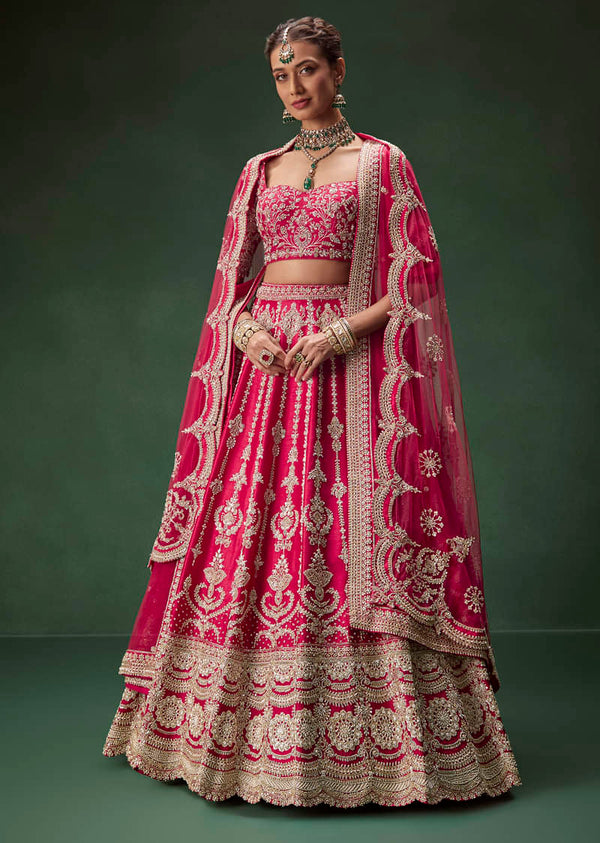 Rani Pink Bridal Lehenga With Embroidered Blouse And Heavily Worked Dupattas