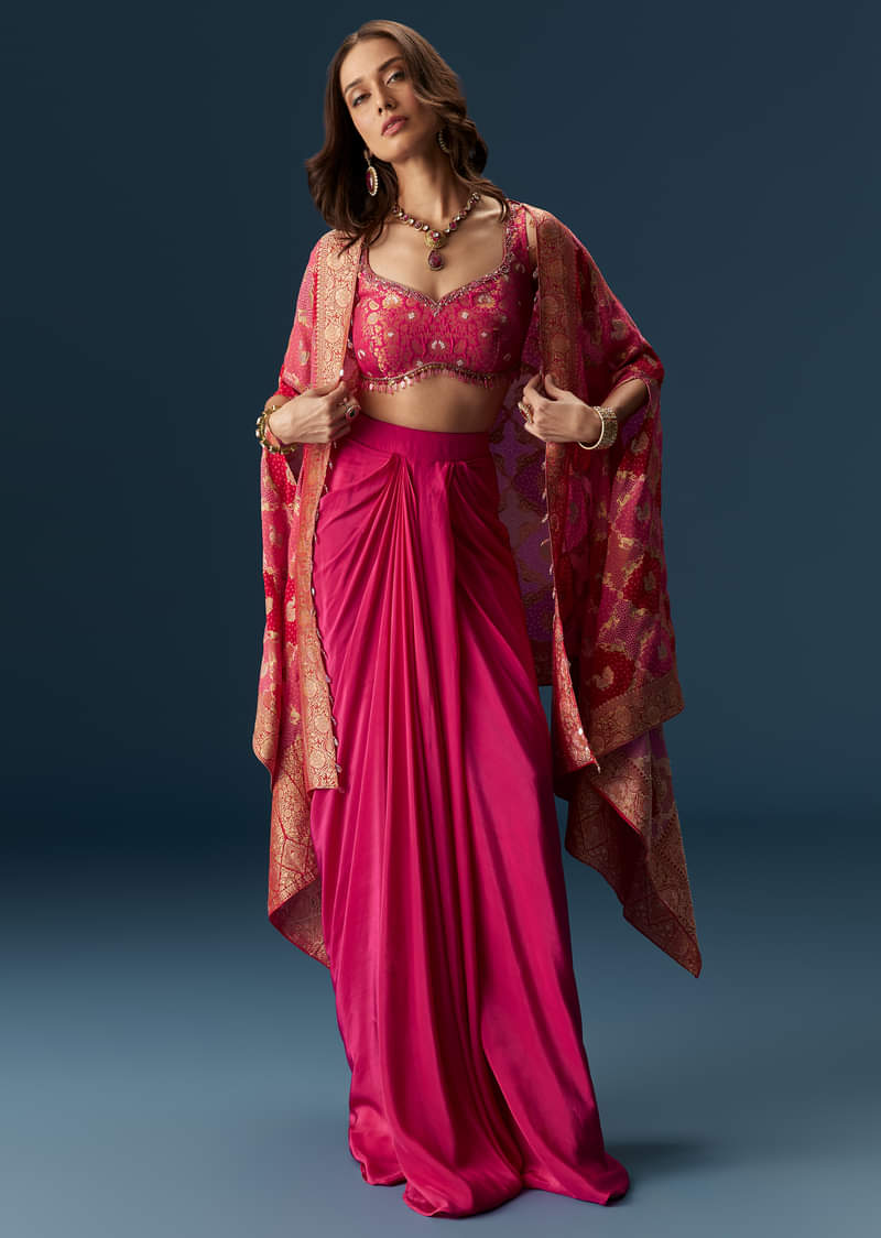 rani-pink-embellished-blouse-and-drape-skirt-set-with-statement-cape-sg306618-1_4a842957-1ca6-4324-a811-38019e140a83.jpg