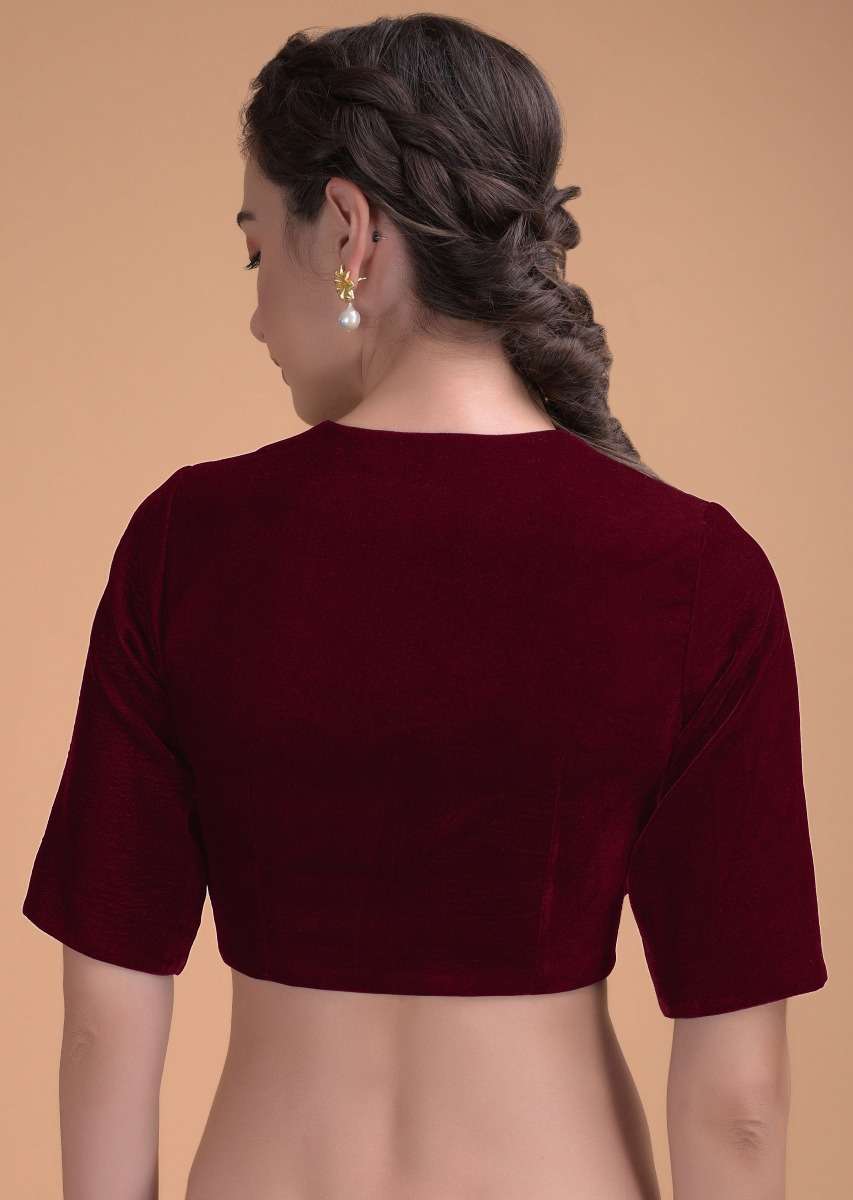 red_blouse_in_velvet_with_a_zari_lace_defining_the_neckline_online_-_kalki_fashion_1_0530ed39-88a7-4596-a505-63b1ca97f840.jpg