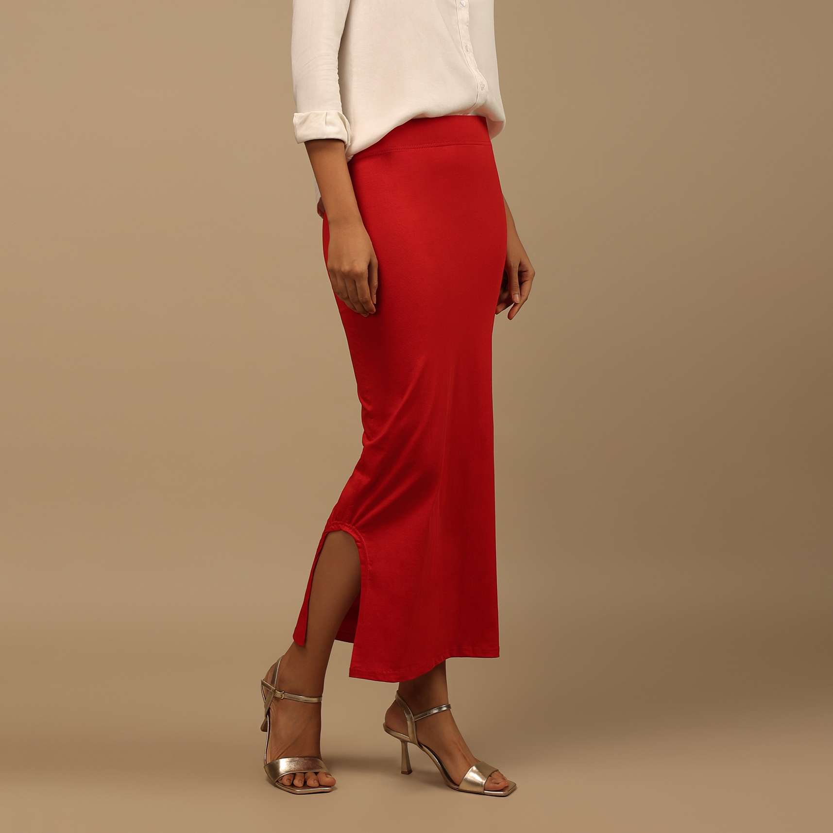 red_shapewear_saree_petticoat_in_cotton_lycra_with_elastic_waistband_and_slit_145_9b1f784c-a37f-4f6c-93f3-a051fa27dd30.jpg