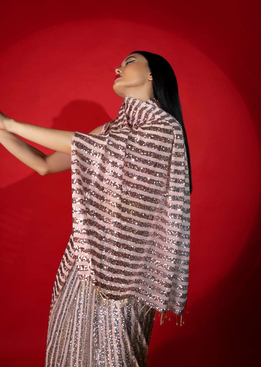 rose-pink-ombre-ready-pleated-saree-in-striped-sequins-fabric-with-a-raw-silk-blouse-embellished-with-sequins-m001at369y-sg61176_1_87b1ecd9-4899-4602-91f3-6f57b31e0d40.jpg