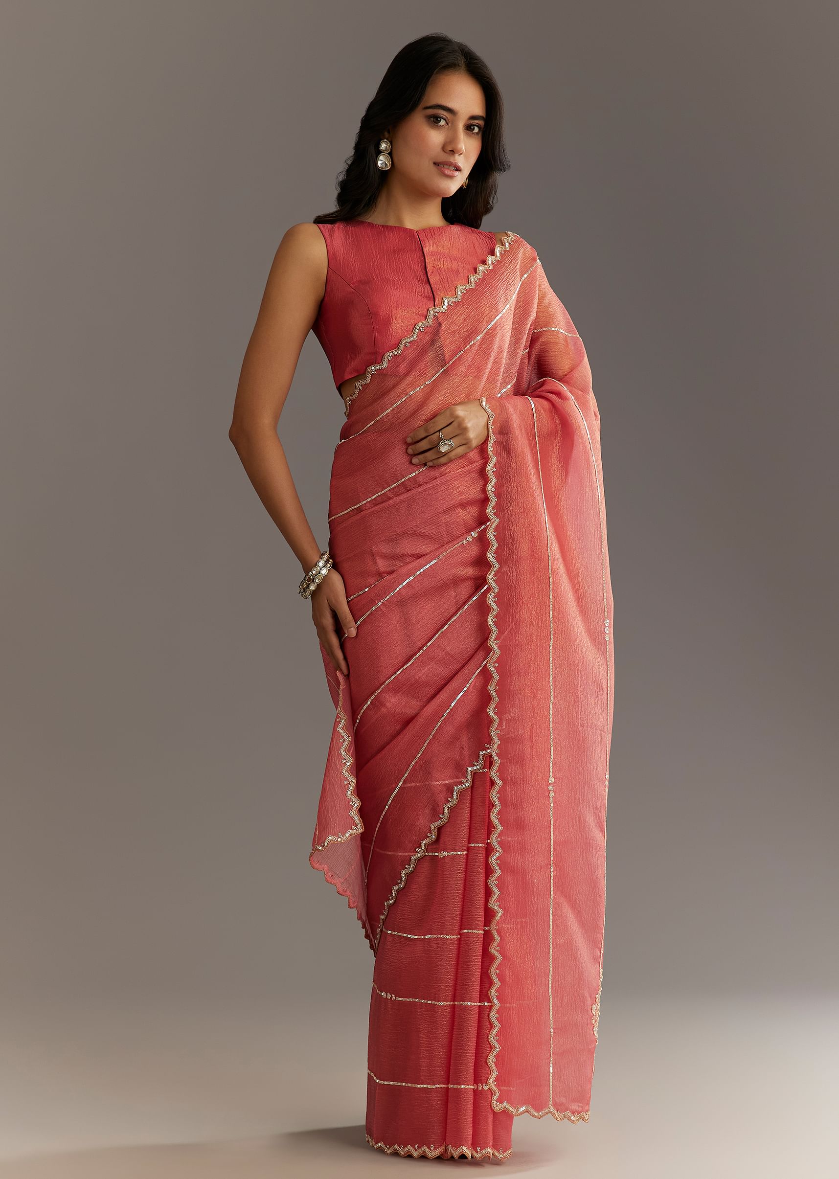 rush-peach-crushed-tissue-saree-with-scallop-embroidered-bor-sg294614-1_28bbb410-4ccc-44d5-8b1d-0c78af66cda3.jpg