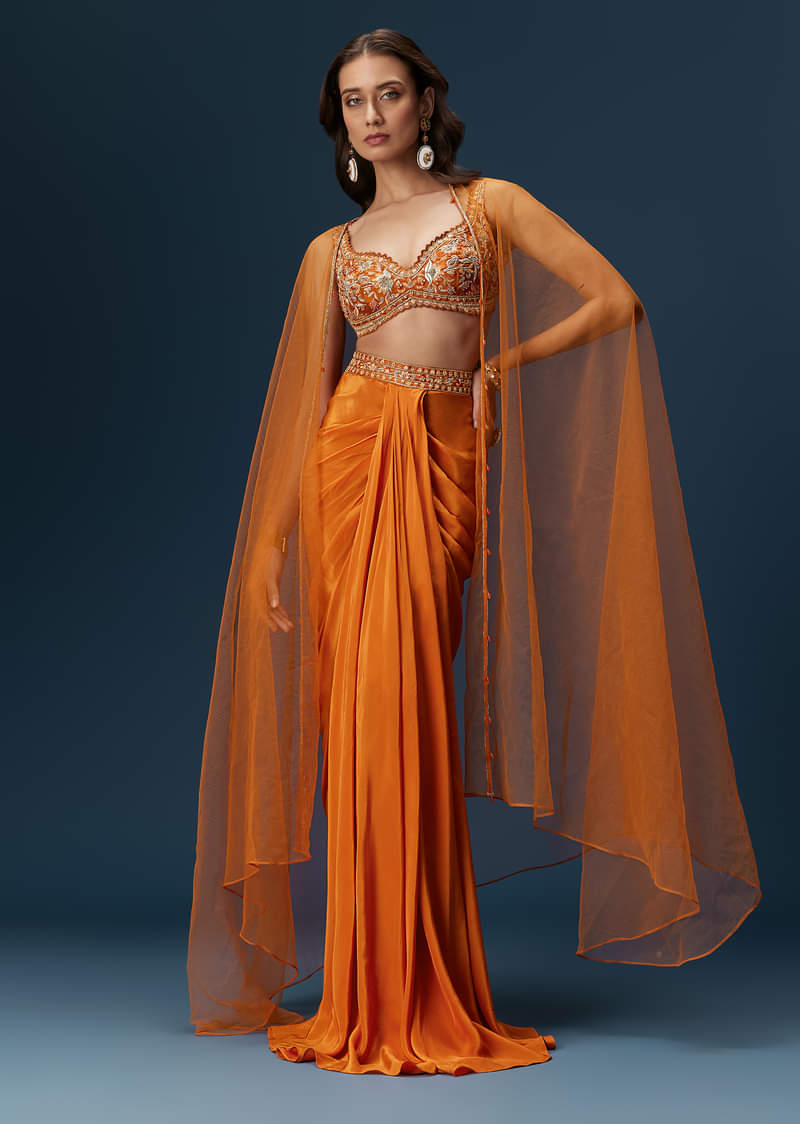 rust-dhoti-skirt-set-with-embellished-blouse-and-tassel-net-dupatta-sg320249-1_1452b20f-4b00-48cb-9167-18a97d693da5.jpg