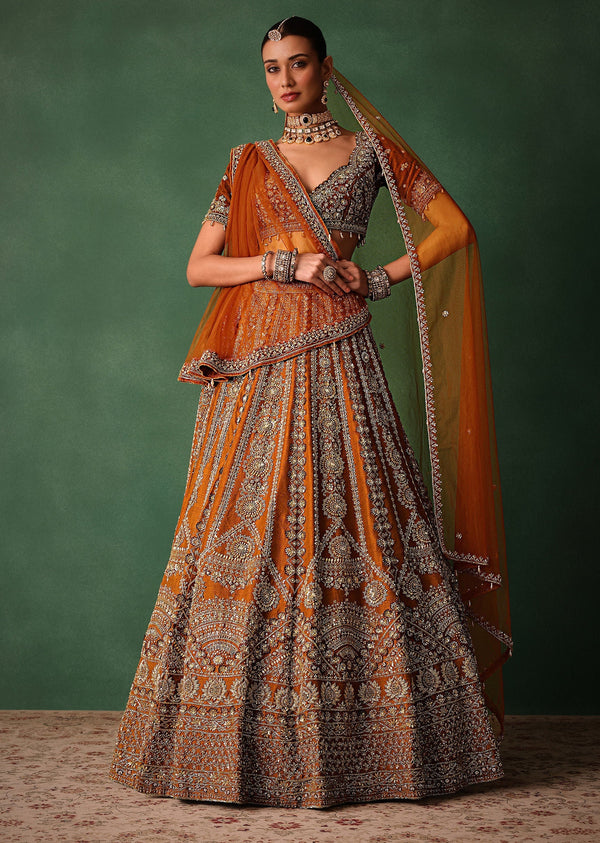 Rust Embroidered Bridal Lehenga With Deep Neckline Blouse And Dupatta