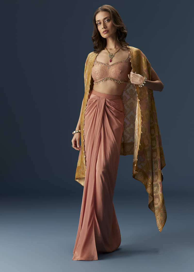 rusty-pink-embroidered-blouse-and-draped-skirt-set-with-embellished-cape-sg302764-1_035da857-cc73-4f88-8696-7fb9d54e39ad.jpg