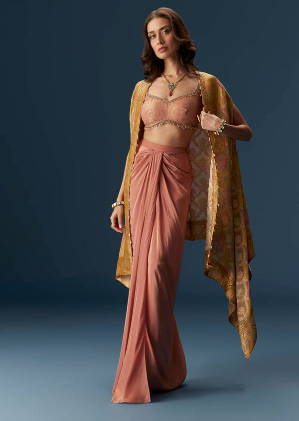 Rusty Pink Embroidered Blouse And Draped Skirt Set With Embellished Cape