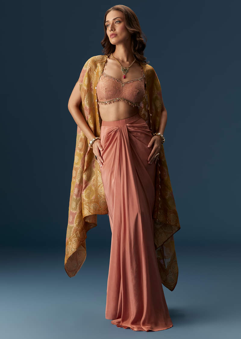 rusty-pink-embroidered-blouse-and-draped-skirt-set-with-embellished-cape-sg302764-4_5ed26498-c87b-46e2-a874-19f51f153bb5.jpg
