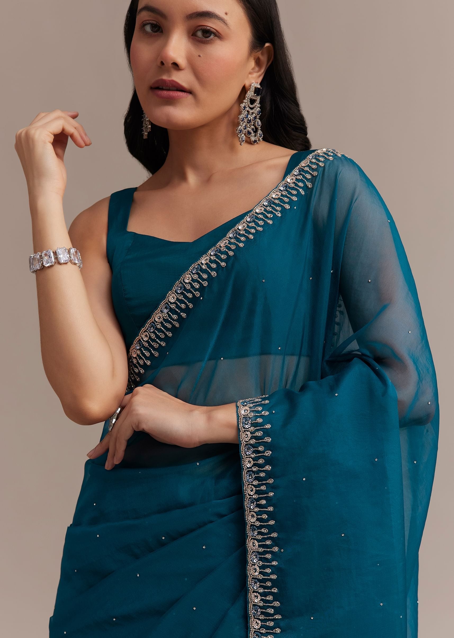 sapphire_blue_organza_saree_with_sequins_and_cutdana_embellished_border-sg276500_5_06352eb9-e0c2-4e02-91e6-3611e6c22c8f.jpg