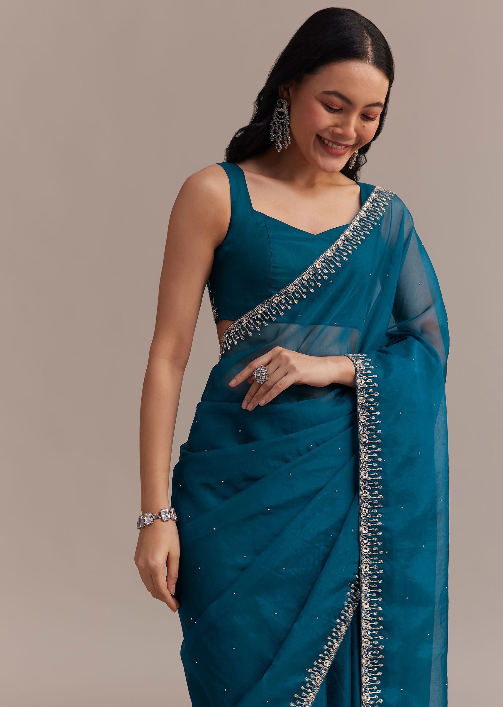 sapphire_blue_organza_saree_with_sequins_and_cutdana_embellished_border-sg276500_6_a36fda56-fe99-443e-a06e-8a0bead7ecae.jpg