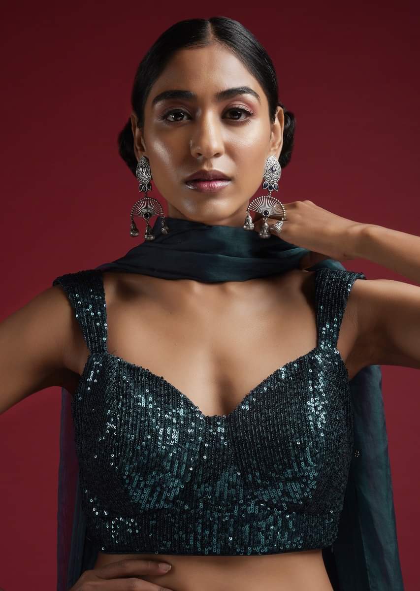sea-blue-blouse-in-sequins-fabric-with-tapering-straps-on-the-shoulders-and-corset-neckline-online_-kalki-fashion-m001bldy42y-sg57018_1__1_026e1e83-b841-4554-8cc1-5bdfd9dbcef8.jpg