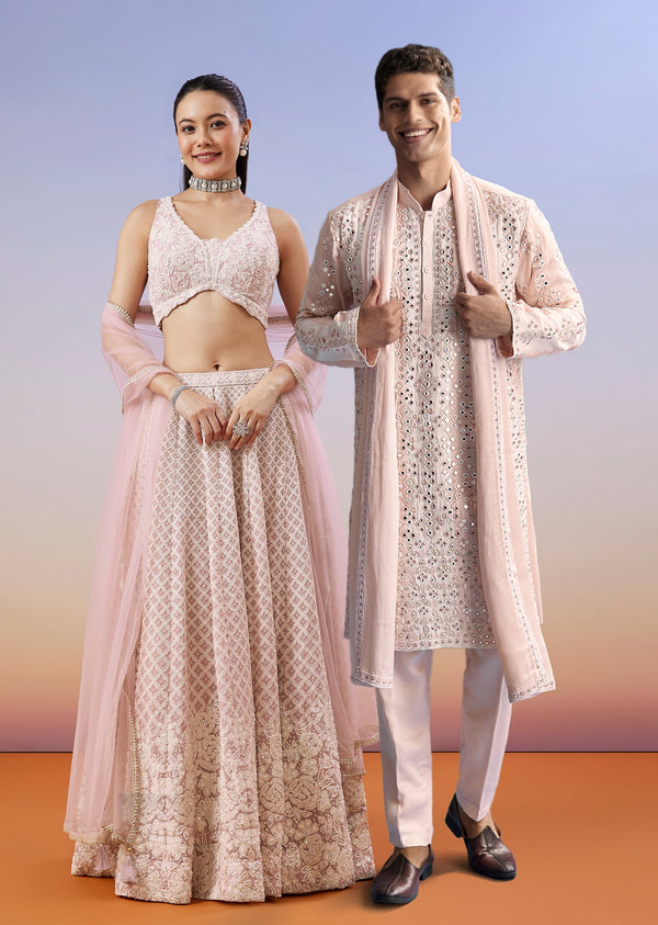 Baby Pink Pastel Duo – Embroidered Lehenga For Her And Mirror Work Kurta Set For Him