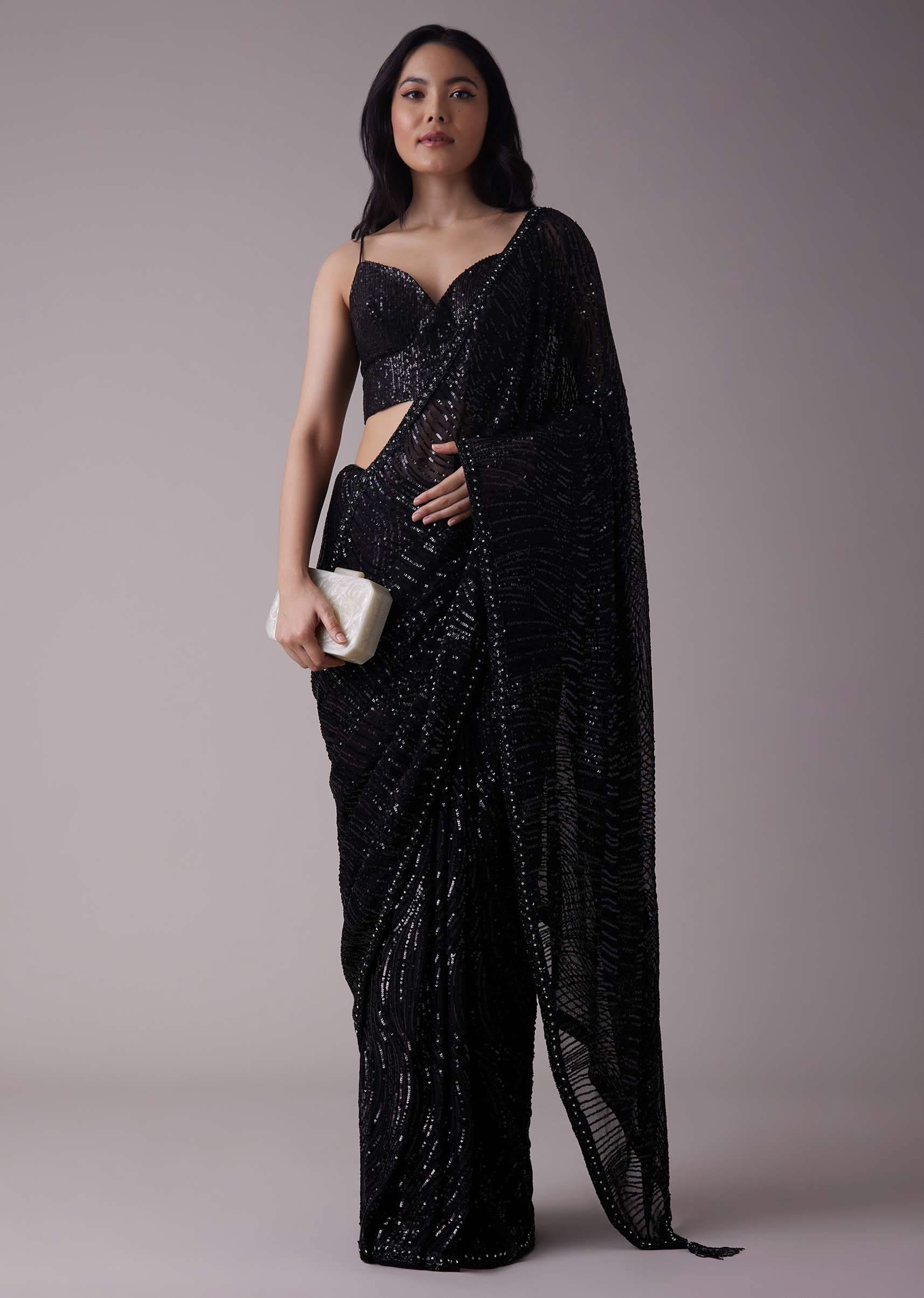 shimmery_black_sequins_saree_with_an_embellished_border_-sg111884_2_290418d7-b0ef-4643-9f44-8c6f9ce4a04c.jpg