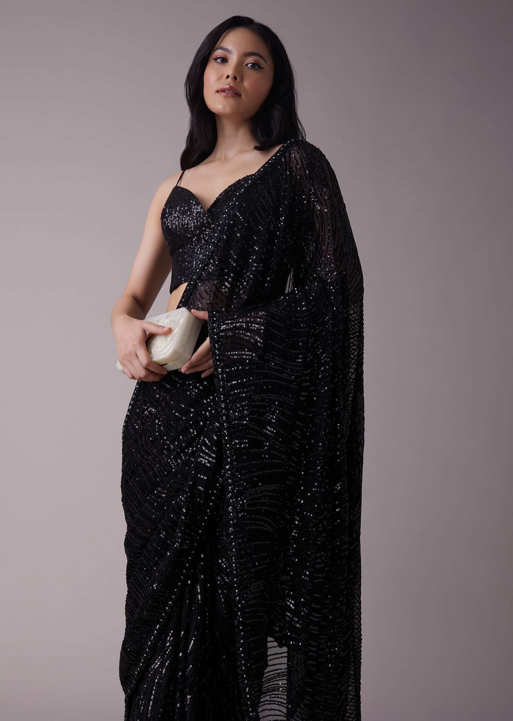 shimmery_black_sequins_saree_with_an_embellished_border_-sg111884_5_f352a1a7-7170-4650-abc7-0f5b2a5373a4.jpg