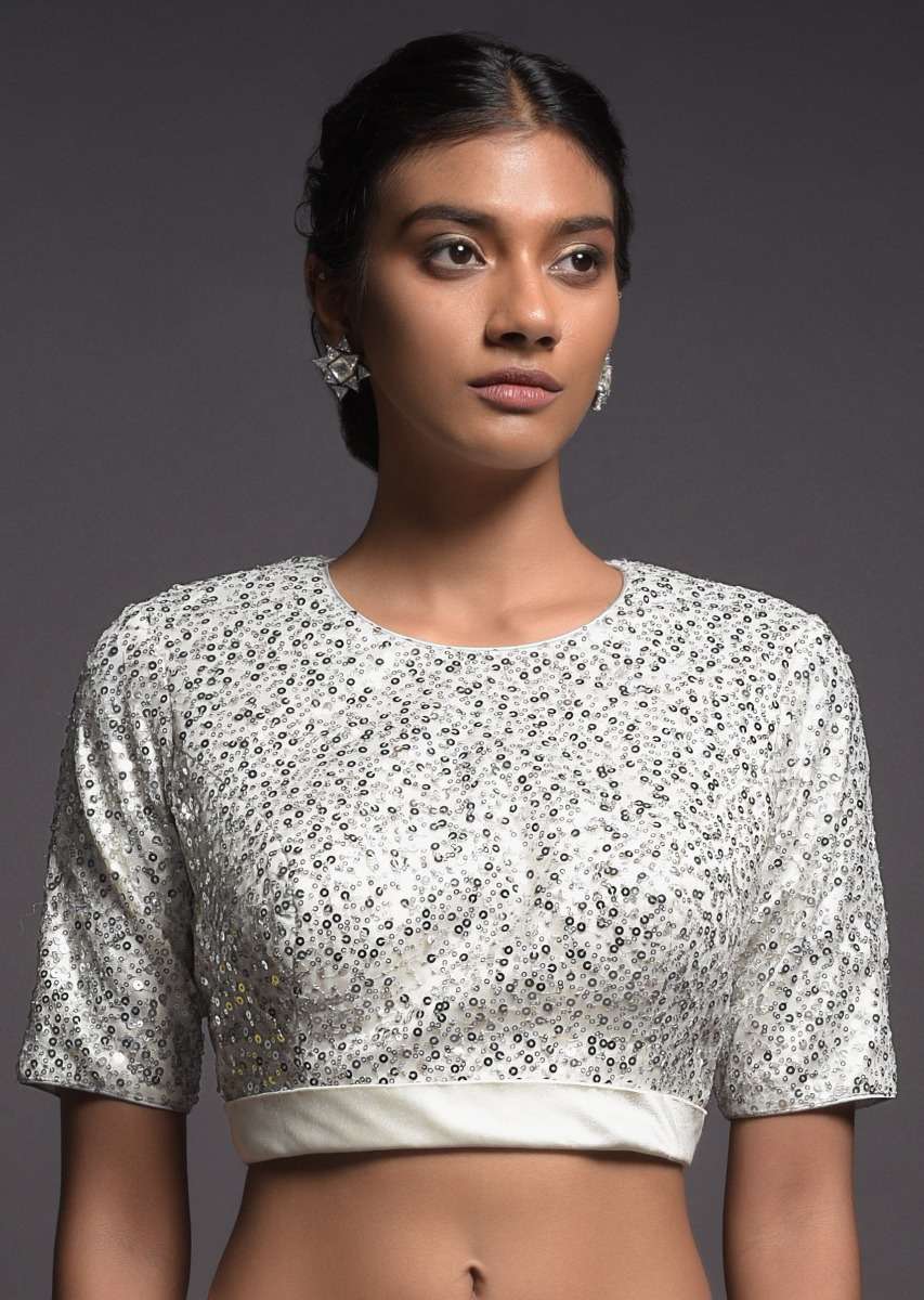 silver-white-blouse-in-sequins-fabric-with-satin-hemline-and-half-sleeves-online-kalki-fashion-m001ps29y-sg39096_3_25c59a1e-b02f-41cb-9727-57525593d84c.jpg