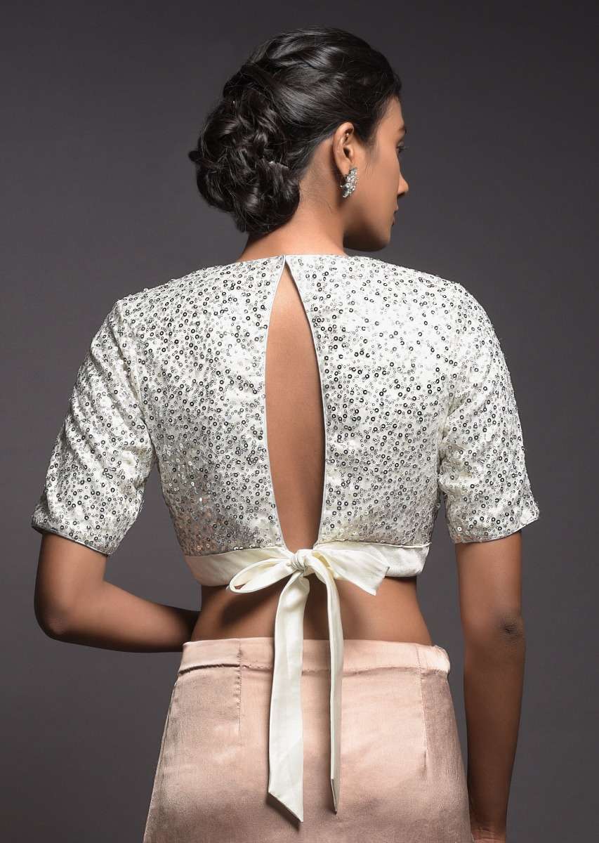silver-white-blouse-in-sequins-fabric-with-satin-hemline-and-half-sleeves-online-kalki-fashion-m001ps29y-sg39096_5_4b04aedf-4ad4-4817-b3a3-13a32d9fc727.jpg