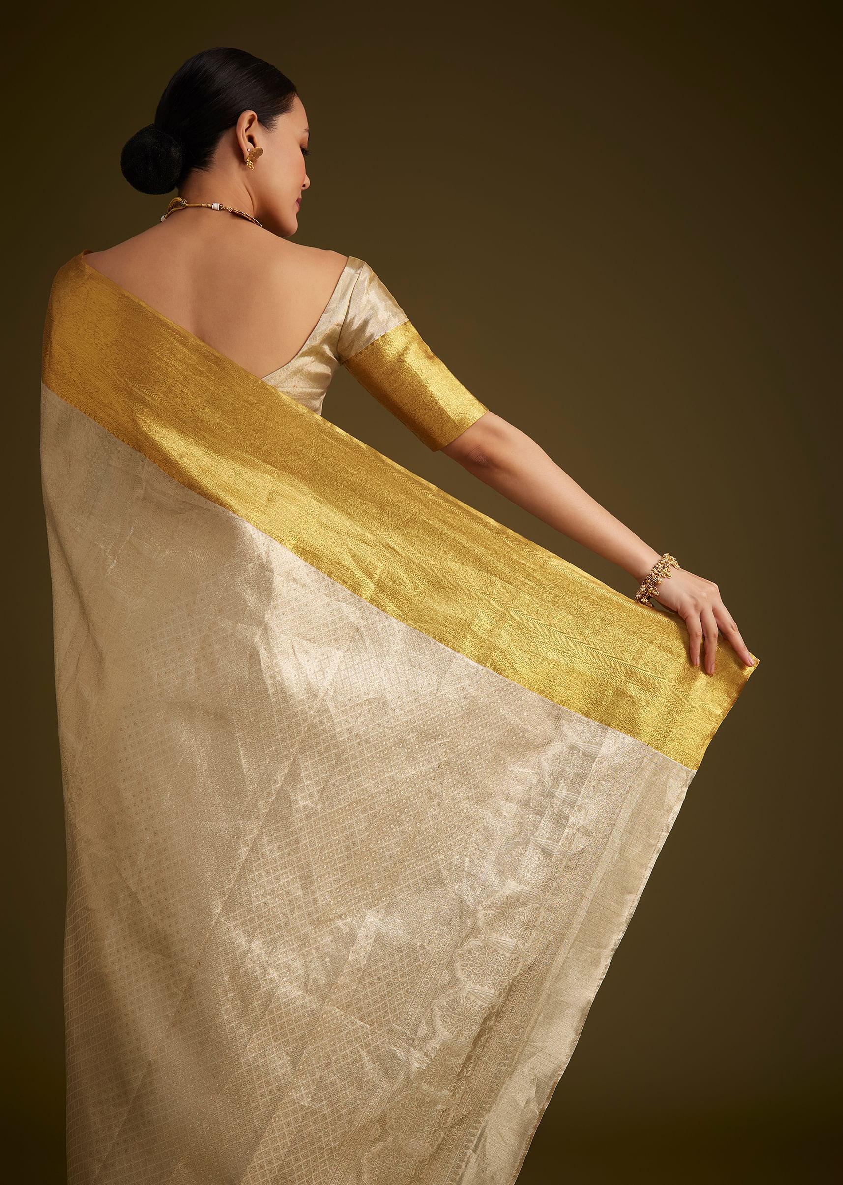 silver_kanjivaram_silk_saree_with_gold_contrast_border_and_p-sg292250_3_2a5ce09d-02fe-440f-b0be-35b485759f54.jpg