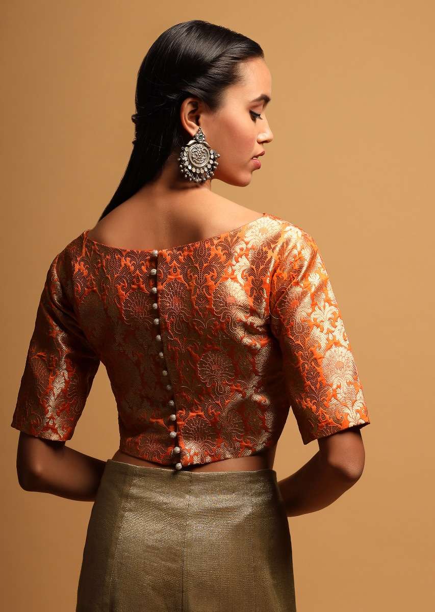 tangerine-orange-blouse-in-brocade-silk-with-woven-floral-jaal-and-34th-sleeves-online-kalki-fashion-m001459180y-sg33914_1_f4cec4cf-d3d1-439c-a3eb-725bbe10a9c9.jpg