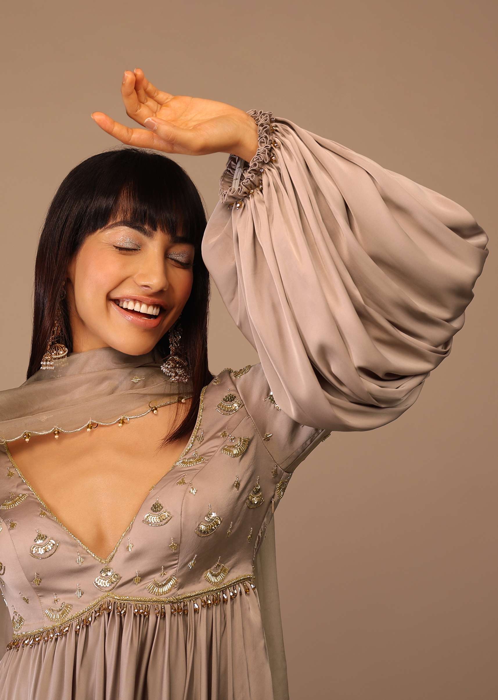 taupe_satin_anarkali_with_hand_embroidered_cutdana_work_and_bishop_sleeves_5_13aec181-911a-47ed-9be2-19b069c26e9c.jpg