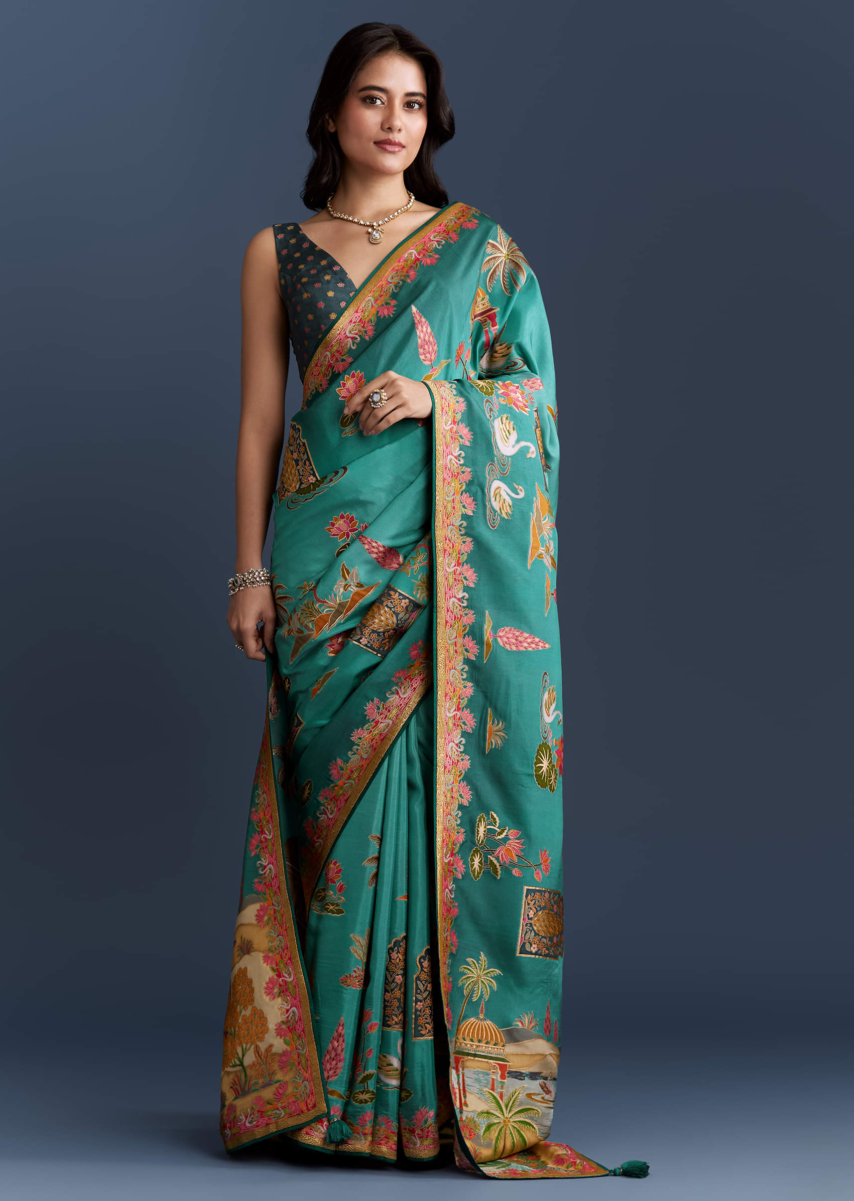 teal-blue-dola-silk-saree-with-nature-motifs-and-embroidery-sg349810-1.jpg