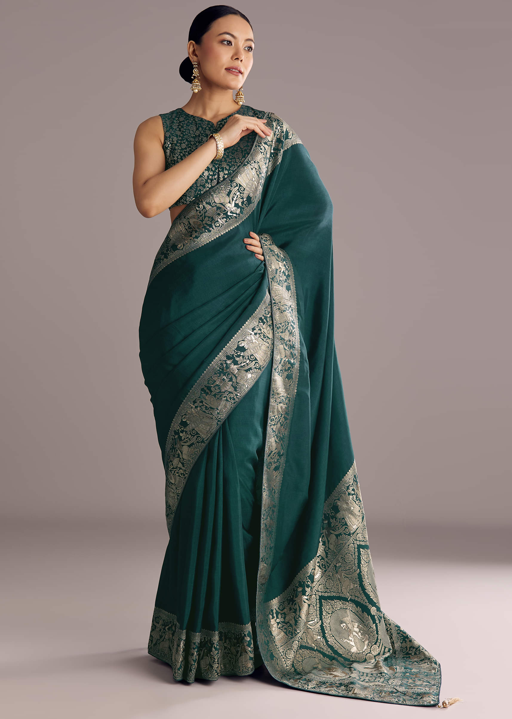 teal-blue-dola-silk-saree-with-zari-woven-motifs-sg311858-1_c0ab09f8-c351-4c29-b2aa-16a58d1a3627.jpg