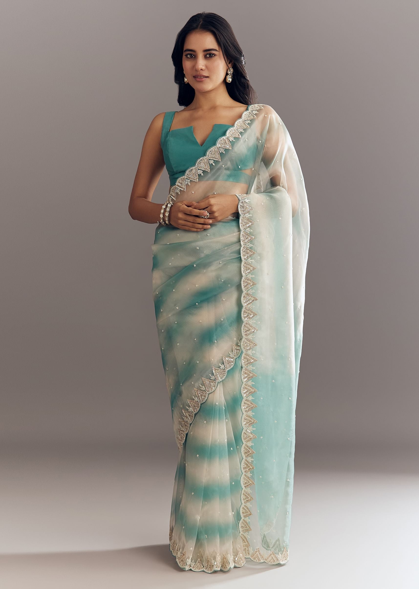 teal-blue-shaded-organza-saree-with-moti-stone-sequins-embroidery-and-cutwork-scallop-border-sg292893-1_674276c8-6954-4f87-bc1f-5b71db262bd0.jpg