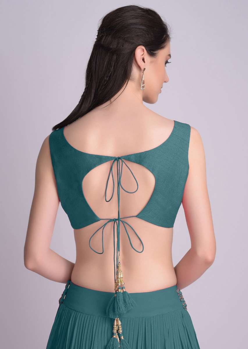 teal-blue-sleeveless-blouse-with-double-tie-up-tassel-dori-at-the-back-online-kalki-fashion-m001509617y-sg31211_1_68b86687-35ba-450e-bd4f-aa1672745065.jpg