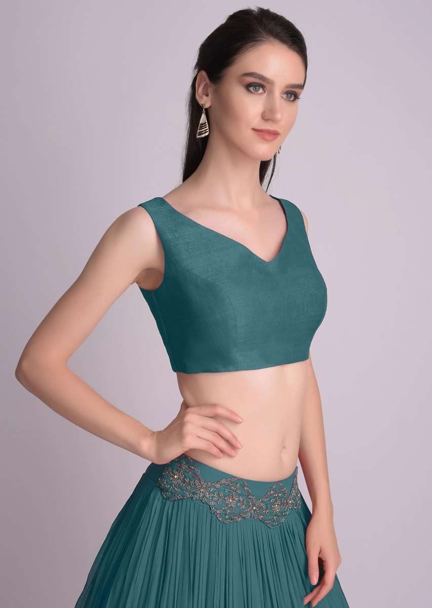 teal-blue-sleeveless-blouse-with-double-tie-up-tassel-dori-at-the-back-online-kalki-fashion-m001509617y-sg31211_4_d58cb88d-9ece-4bb2-99a8-4c61bc785649.jpg
