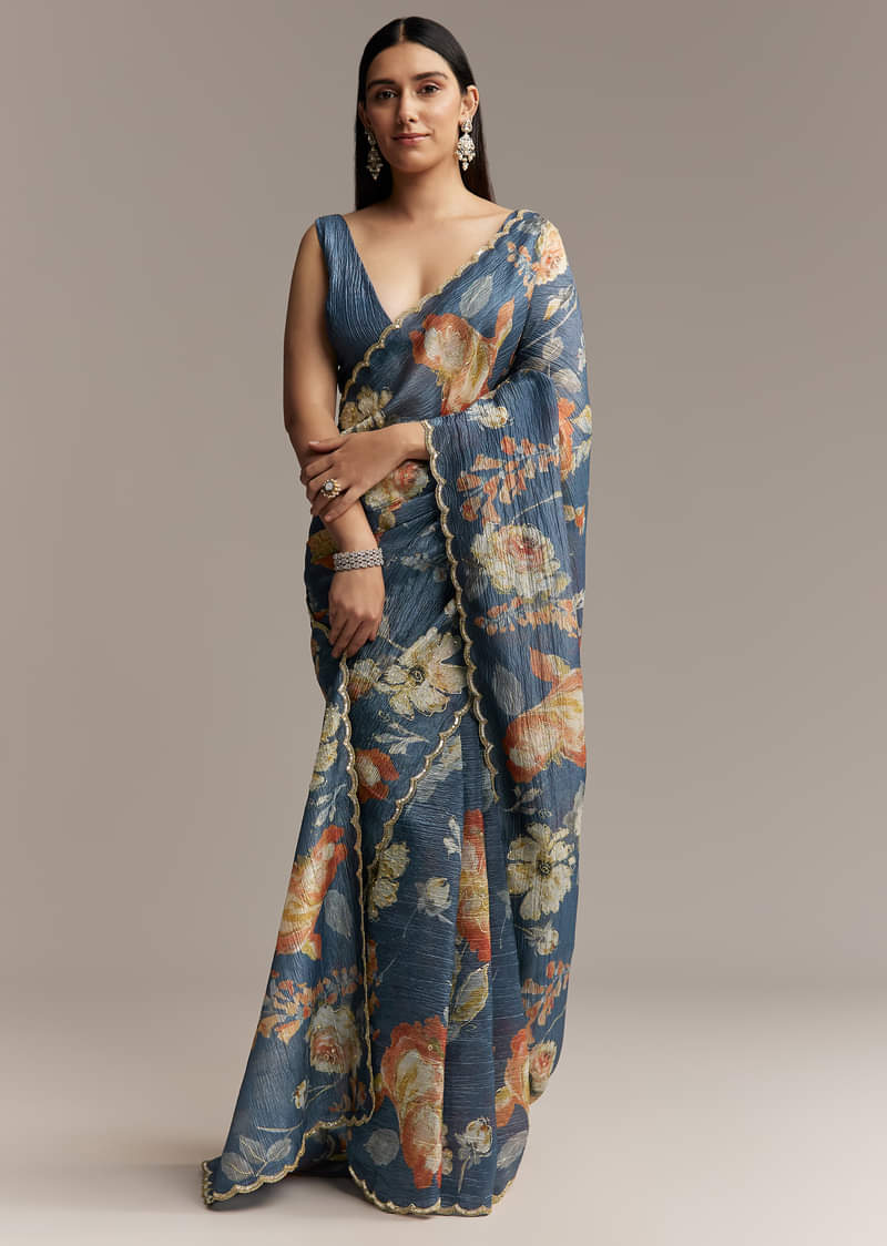teal-blue-tissue-saree-with-floral-print-and-embroidered-border-sg319438-1.jpg